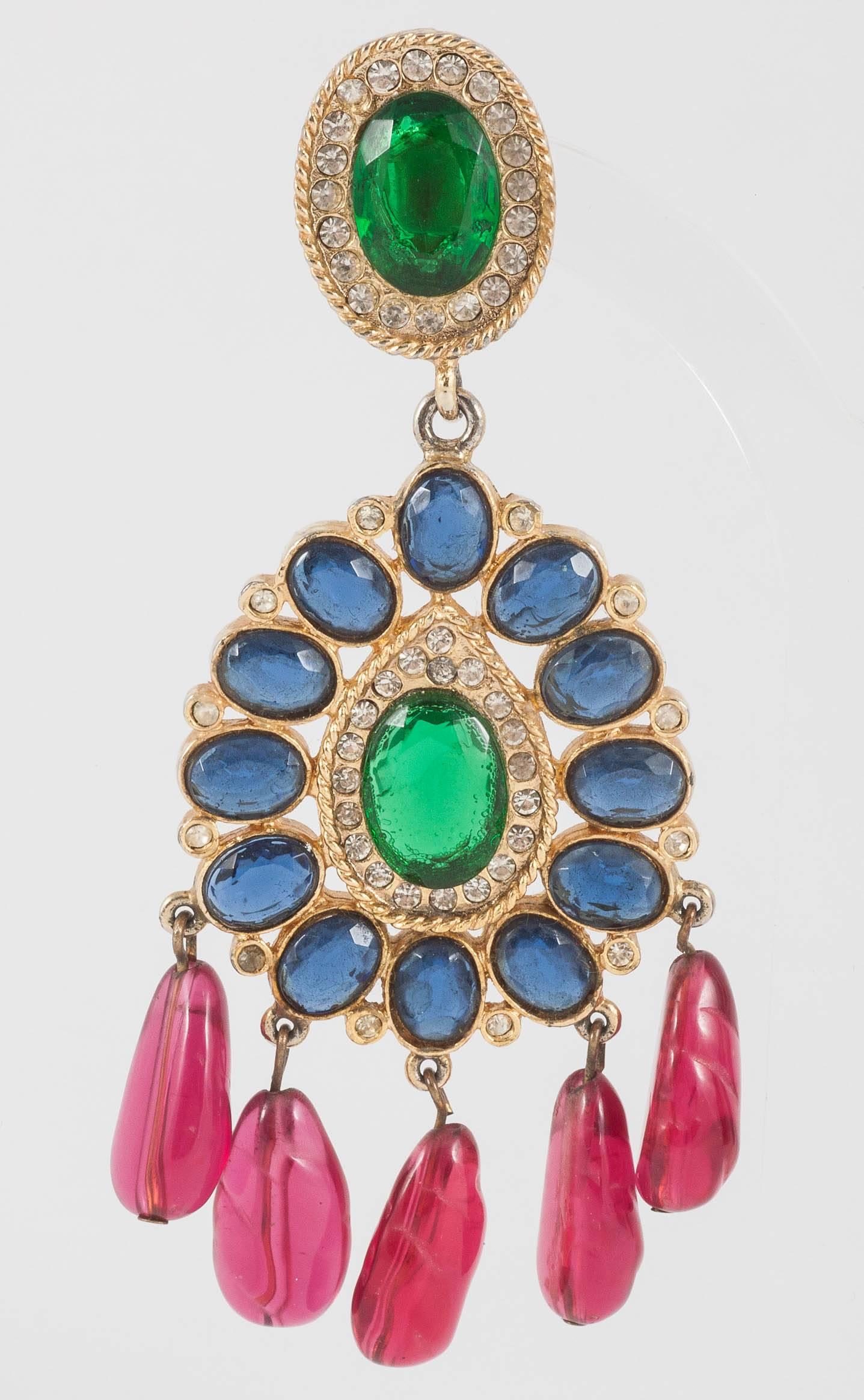 These Kenneth Jay Lane earrings come from the early period of his career and have all the pizazz that that implies. The colour combination is slightly moghul influenced and they have real grandeur. 
The earrings are quite heavy but are well made and