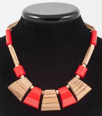 A stylish red Bakelite and wood necklace, USA,  1940s