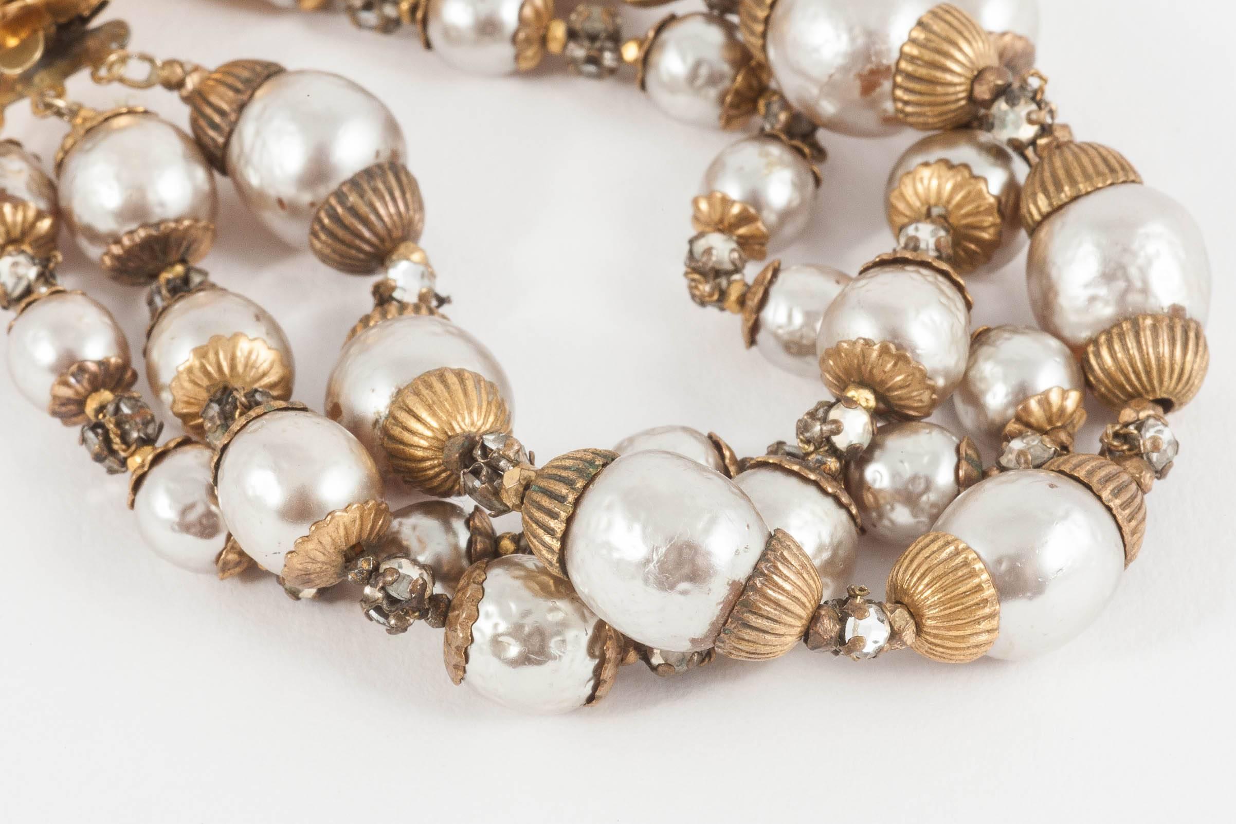 Miriam Haskell baroque pearl, gilt and rose montes bracelet and earrings, 1950s In Excellent Condition In Greyabbey, County Down