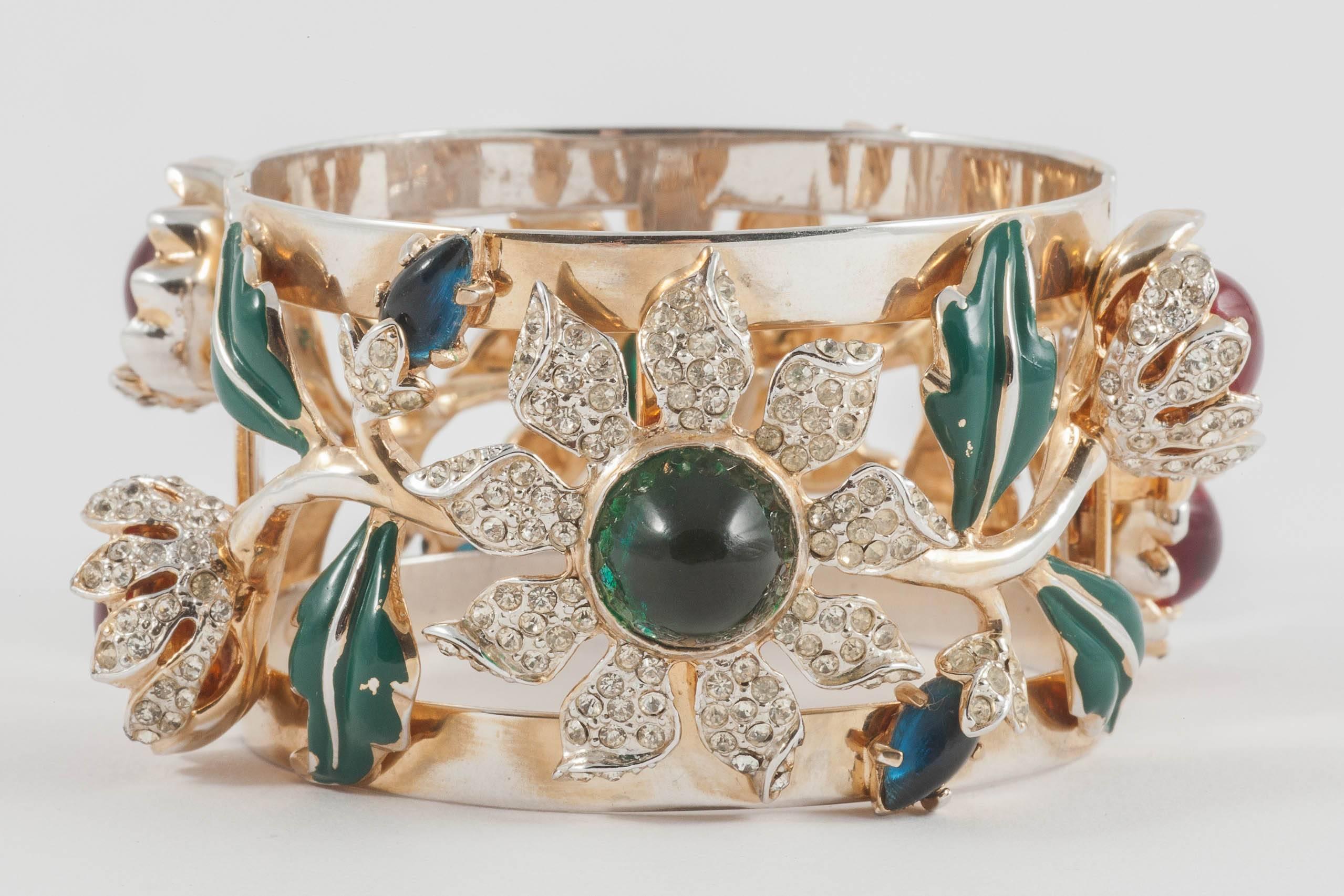 A bracelet of high, high Hollywood glamour (Carmen Miranda wore two of these bracelets, one on top of the other, in the film 'Date with Judy', 1948) and instant impact, it is a very famous design and very collectable. Made from clear paste/paste