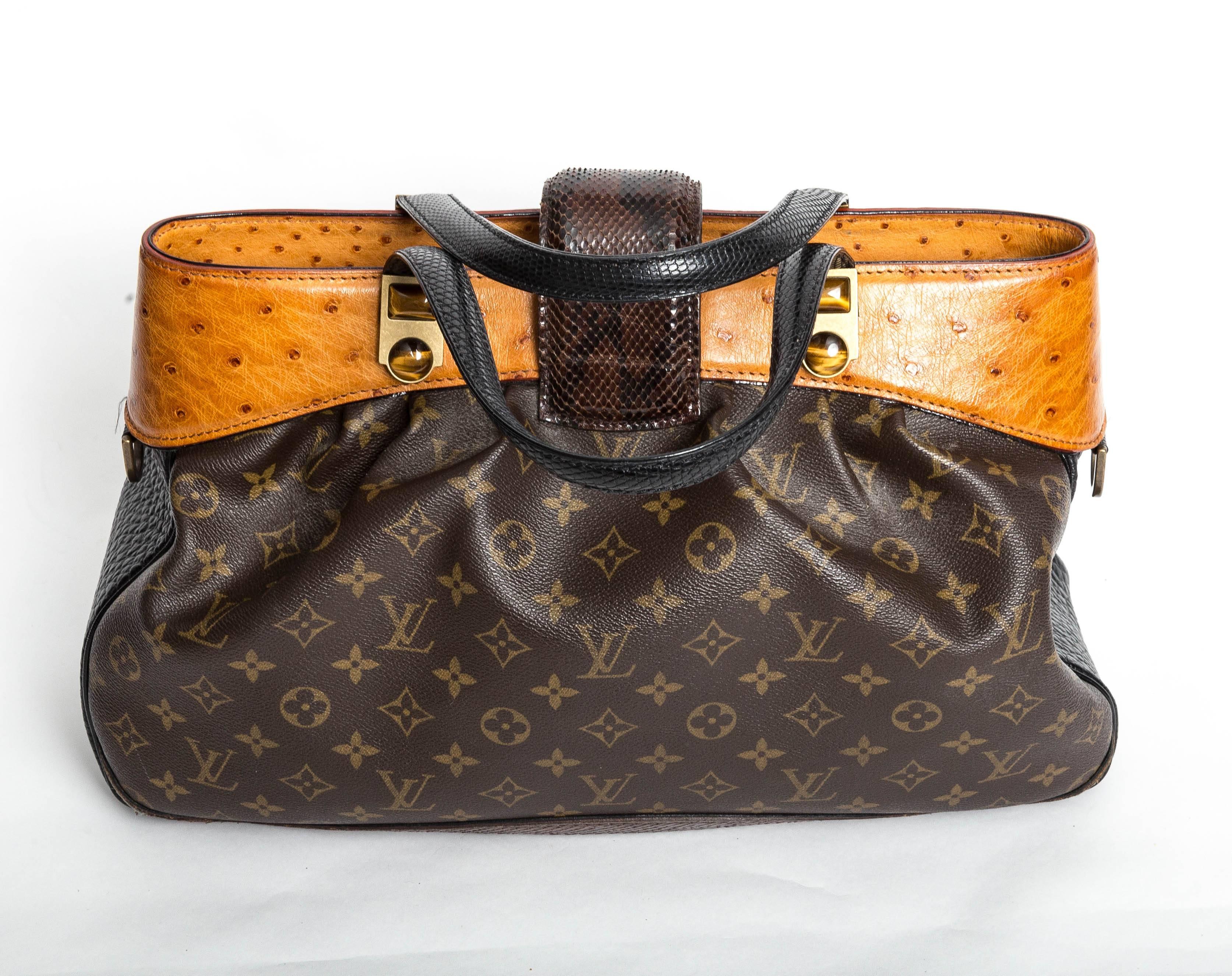 Fabulous Louis Vuitton Limited Edition Oskar Waltz Handbag in Excellent Condition.
From Louis Vuitton's 2005 Fall/Winter Runway Collection, and seen on the arm of Oprah Winfrey, this stunning bag is made of Louis Vuitton's Monogram canvas with