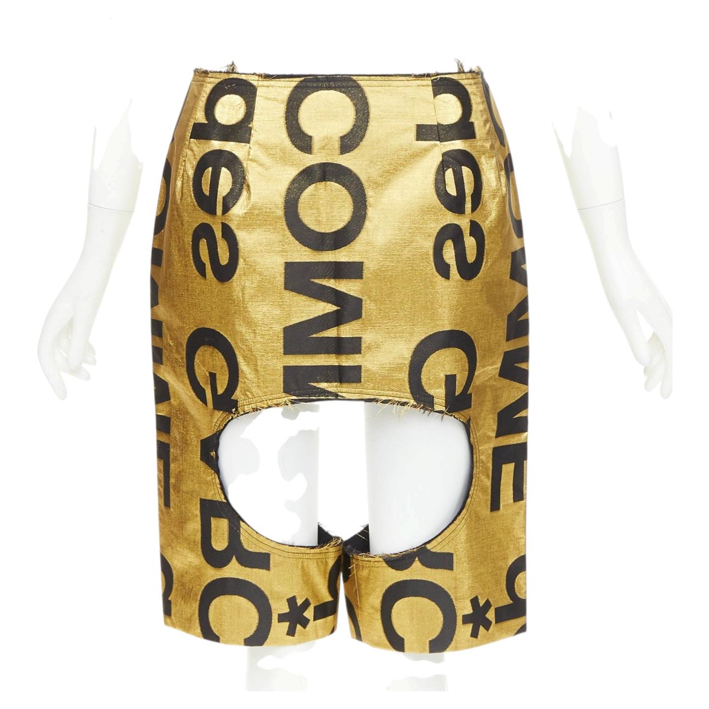 COMME DES GARCONS 2020 Runway gold black polyester silk logo cut out shorts M For Sale