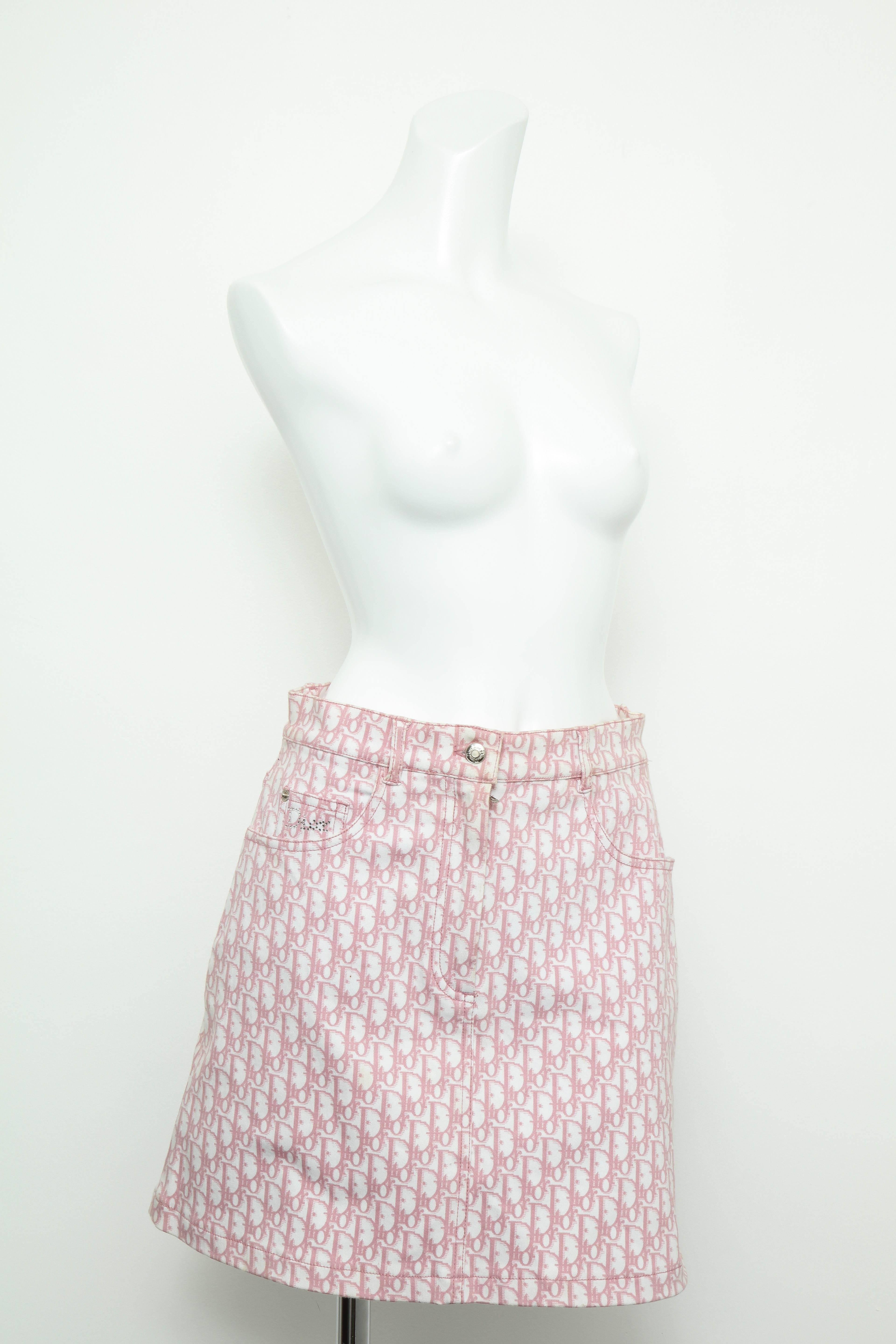 Christian Dior pink trotter logo skirt designed by John Galliano.

FR Size 42