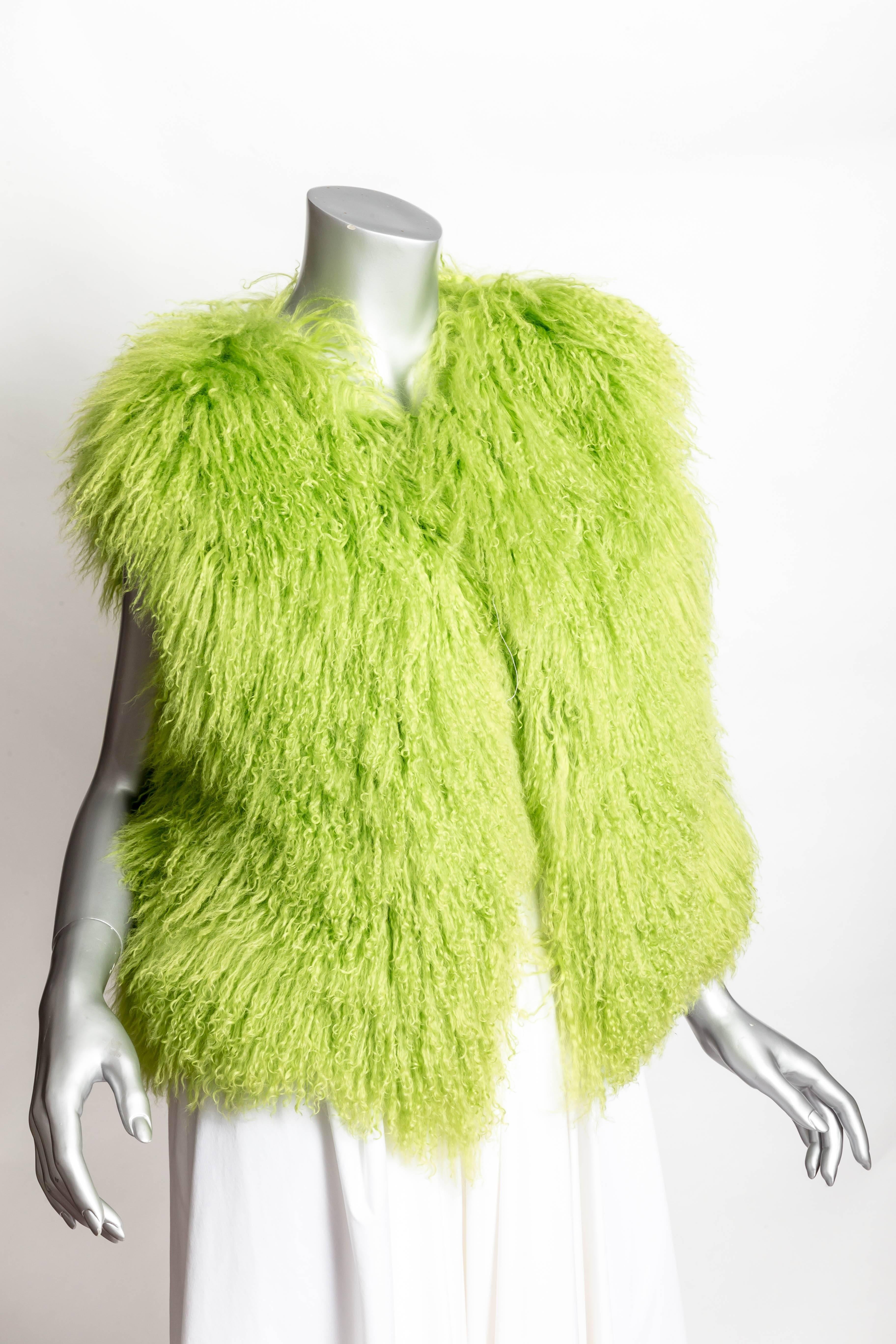 Quirky Lisa Perry Mongolian Lamb vest in neon green.
One Size Fits All
