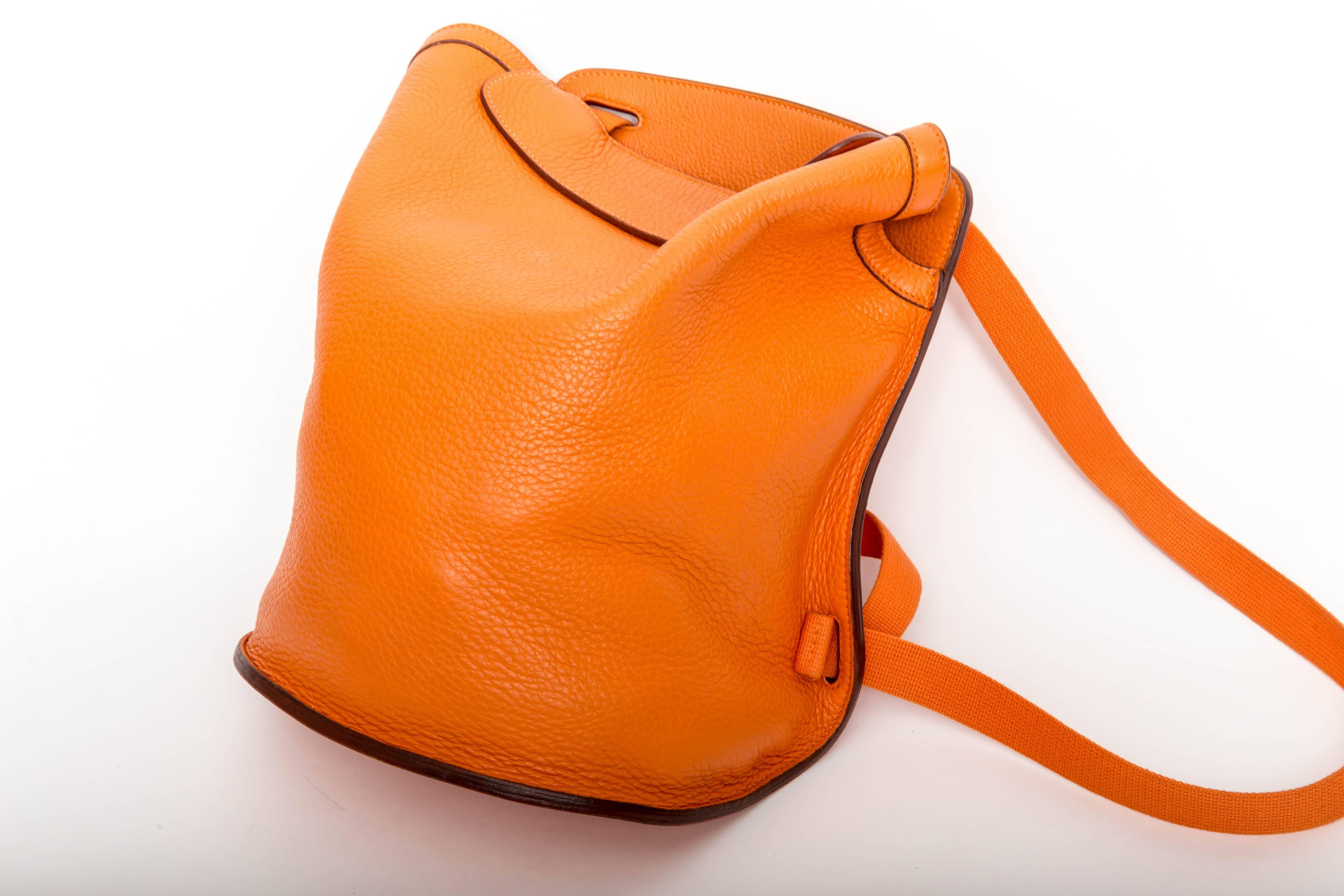 Fabulous Hermes Backpack in Orange Clemence with Dustbag.
Some marks to interior bottom of bag.
Exterior is in excellent condition.
Straps were recently replaced by Hermes and are in immaculate condition.
