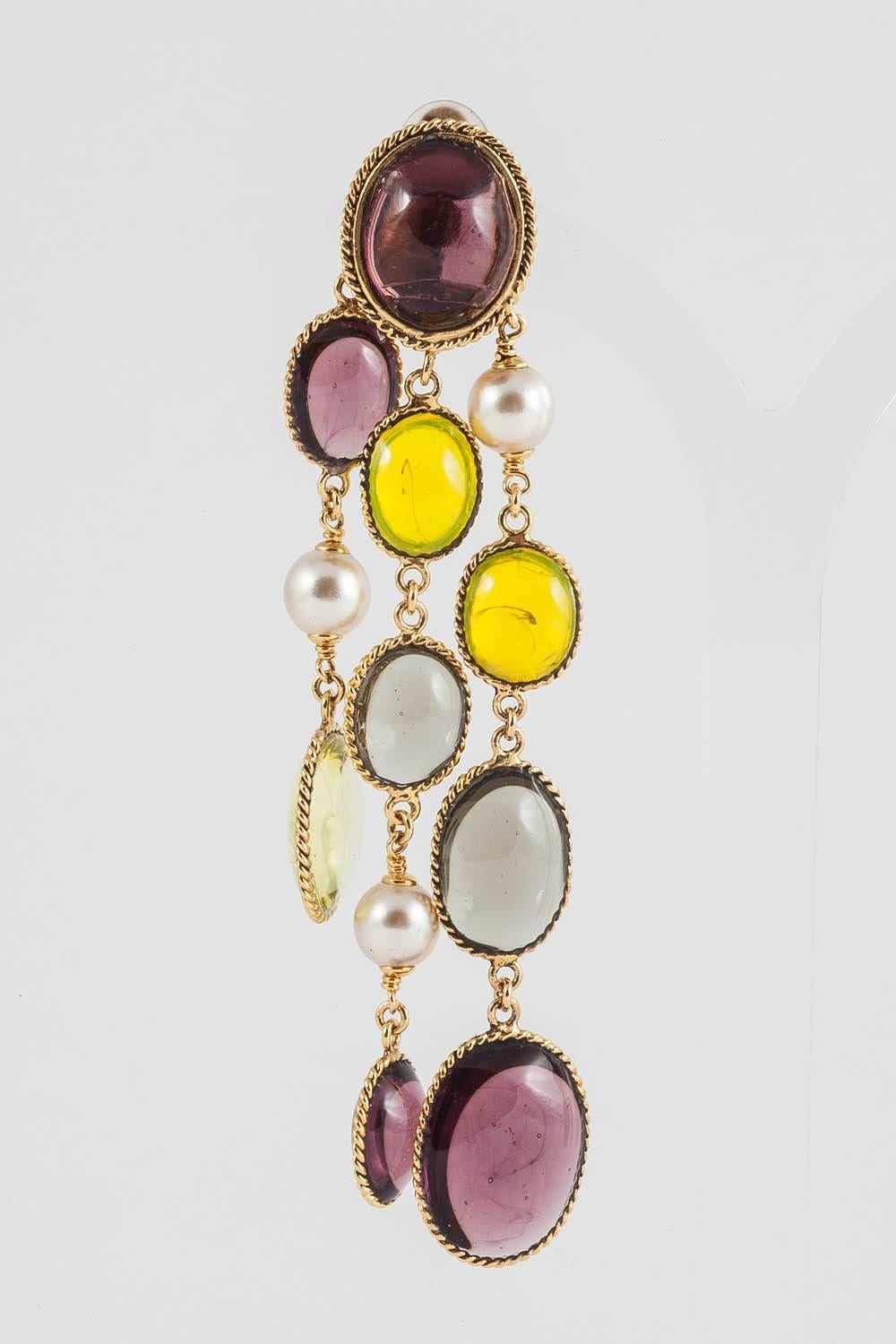 Chic and elegant articulated signed drop earrings in cascading hues of transparent amethyst, grey, opaline yellow poured glass,mixed with pearls, from the 'Harlequin' range in the WW collection, a contemporary limited edition, designed in London,