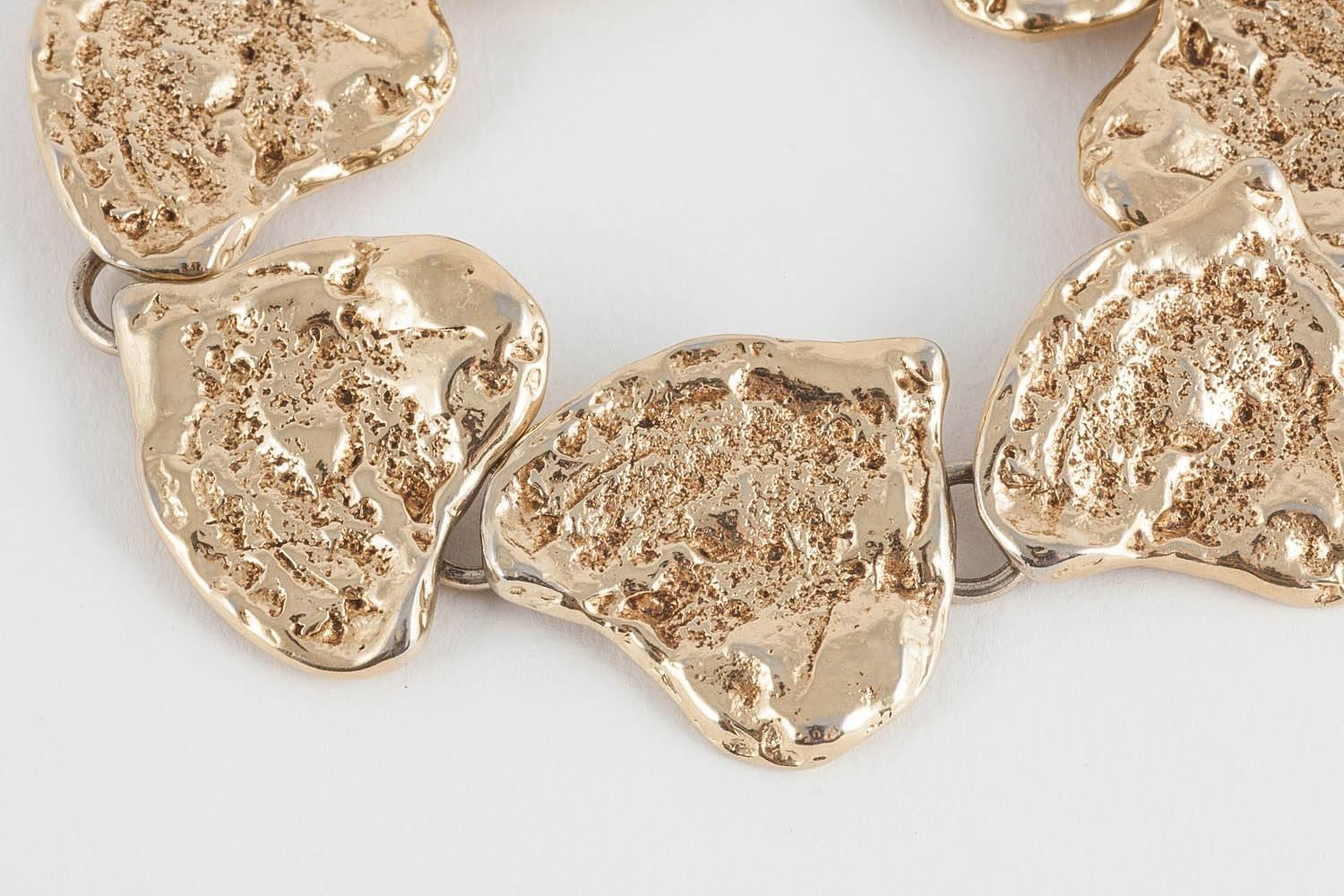 This is a fantastic, really wearable bracelet by YSL dating from the 1980s. 
It is a good size so would fit a bigger wrist if needed. 
Yves Saint Laurent was born in 1936, and became one of the 20th Century’s most famous and prolific fashion