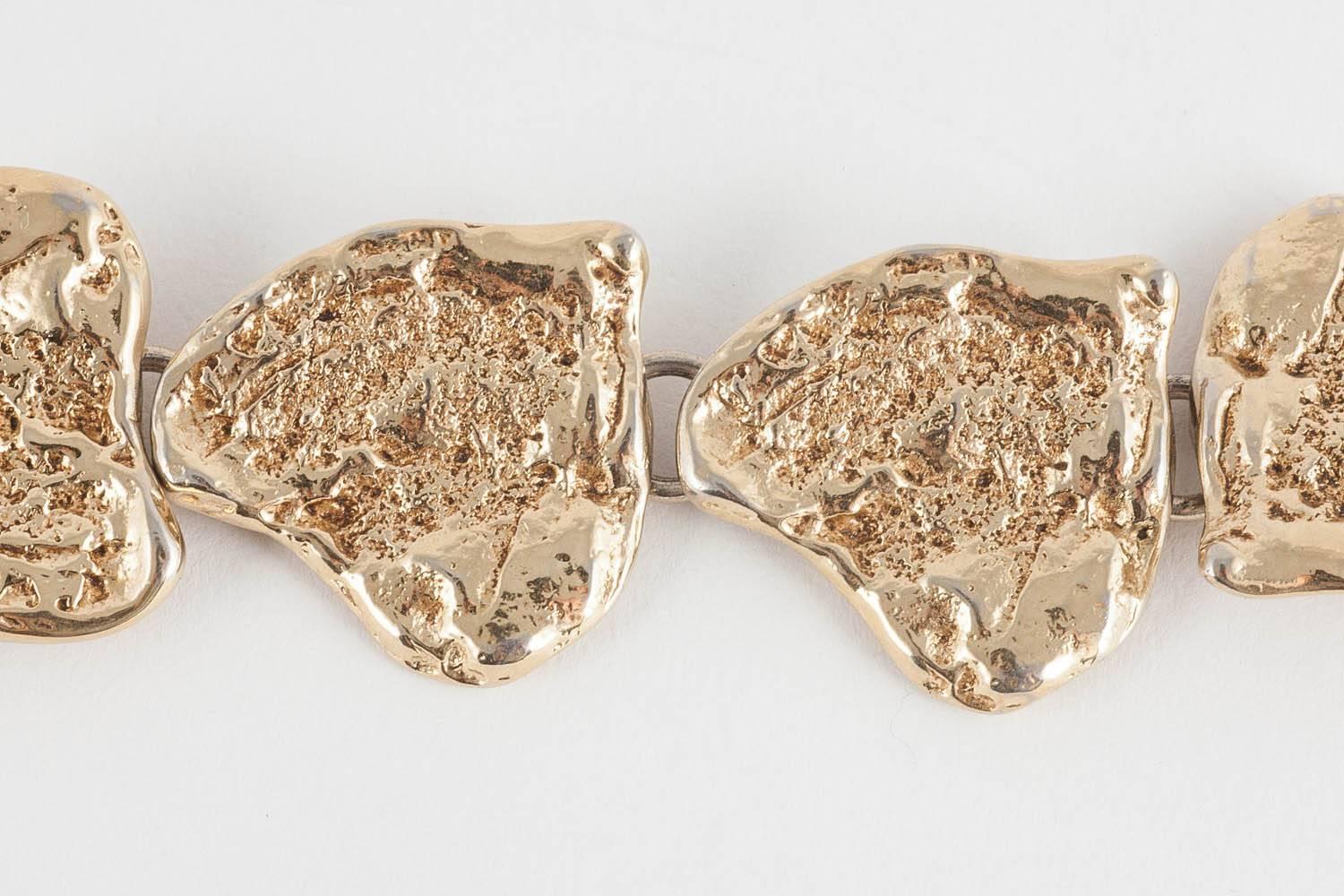 Women's or Men's Yves Saint Laurent rusticated gilt metal 'hearts'  bracelet, 1980s