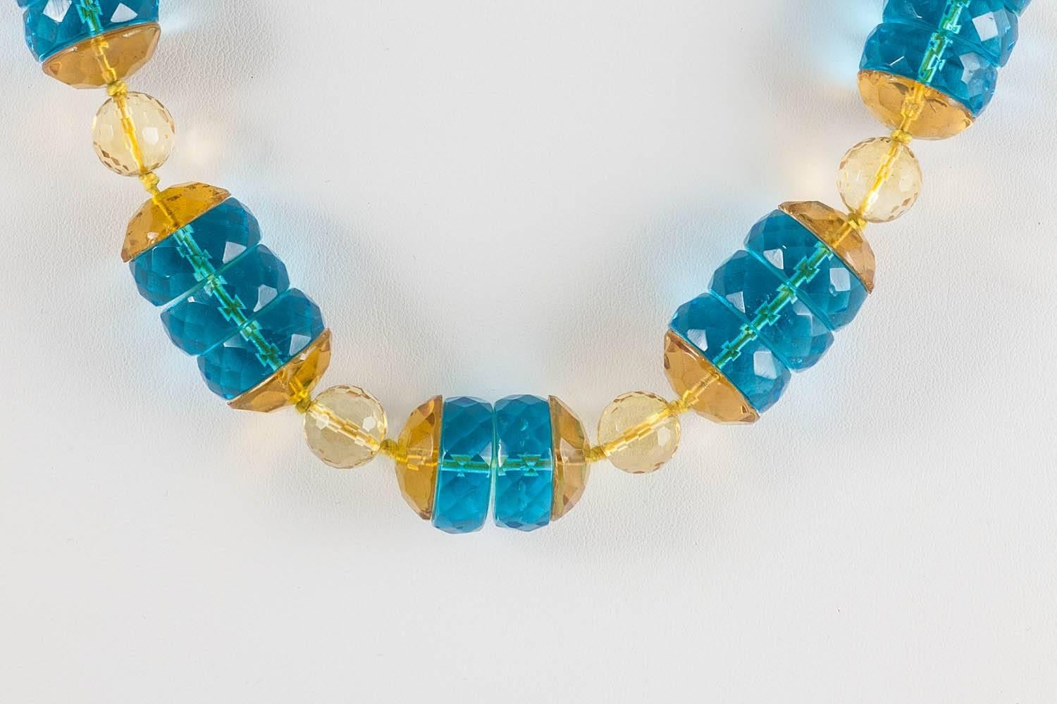 The colours in this magnificent necklace are really unusual and dynamic. Restrung with yellow silk to emphasize the beauty of the glass, this is a great addition to any Deco collection, and super wearable too.
