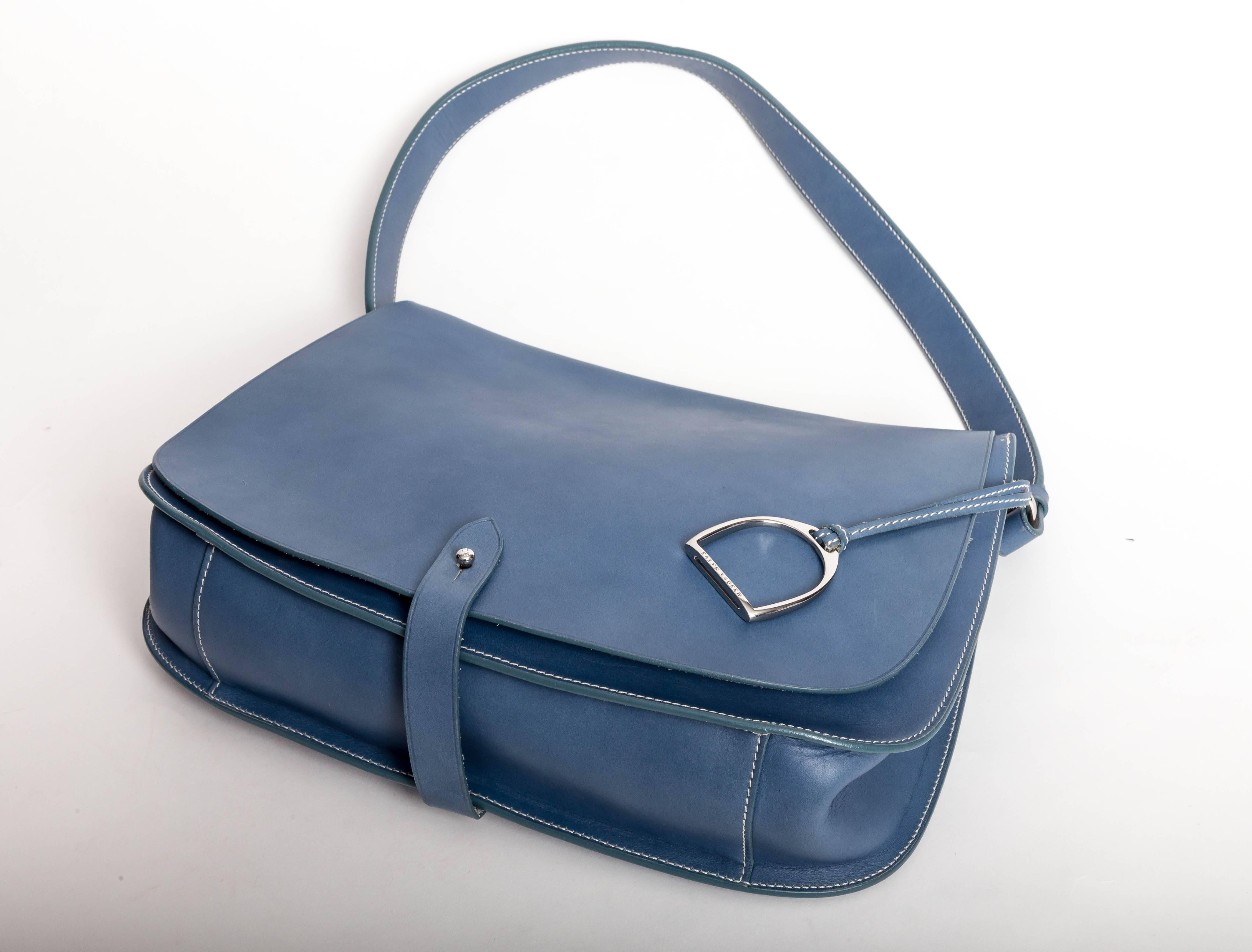 Great Ralph Lauren saddle bag in Sky Blue Leather.
Original retail price $1250
Condition is excellent with the exception of a couple of scratches to the rear of the bag.
Shoulder strap is adjustable.
Strap drop is 11.5 inches but can be made