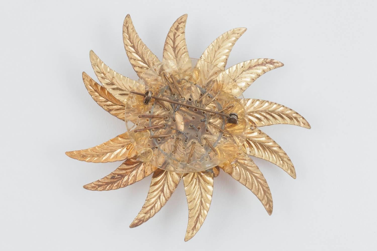 A striking gilt and topaz paste 'sunburst' brooch, Miriam Haskell, USA, 1930s. For Sale 1
