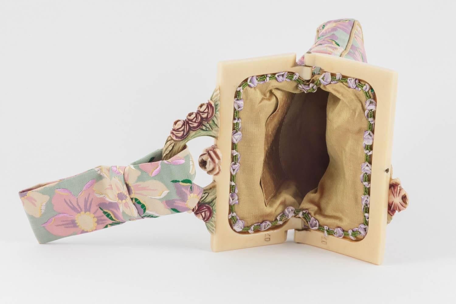 An embroidered floral silk and ivorine framed small handbag, English, 1920s. 1
