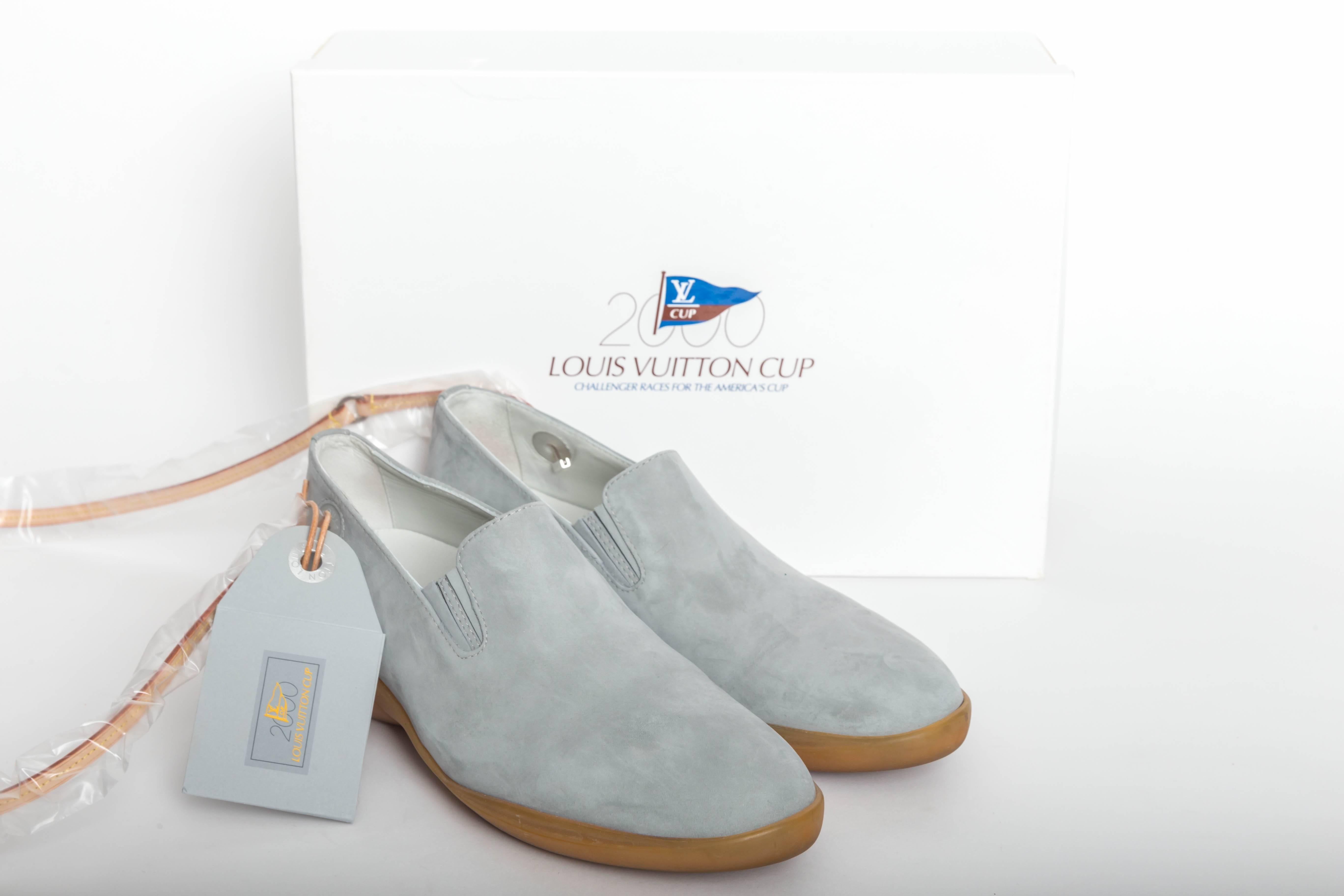  Incredibly Rare Vintage Louis Vuitton Blue Suede Boat Shoes / Loafers made for the America's Cup held in the year 2000.
Original Box is included.
Insole reads Louis Vuitton Cup.
Shoes have a small plastic hole embossed with Louis Vuitton designed
