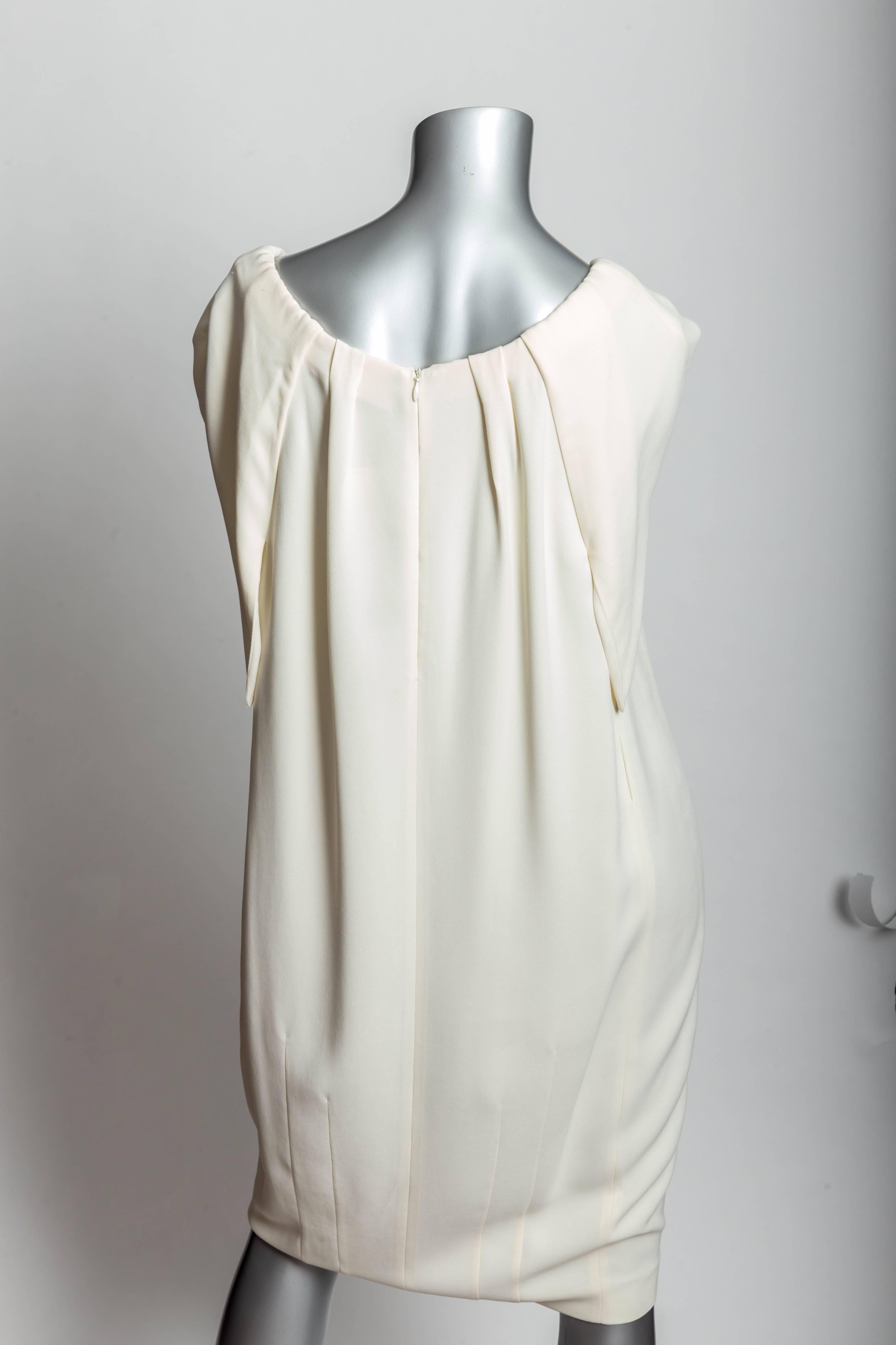 Very pretty Rachel Roy Cold Shoulder Dress - Size 12
Two front faux pockets. Sleeve length above the elbow / 15 inches from shoulder. Fully lined.
Excellent condition