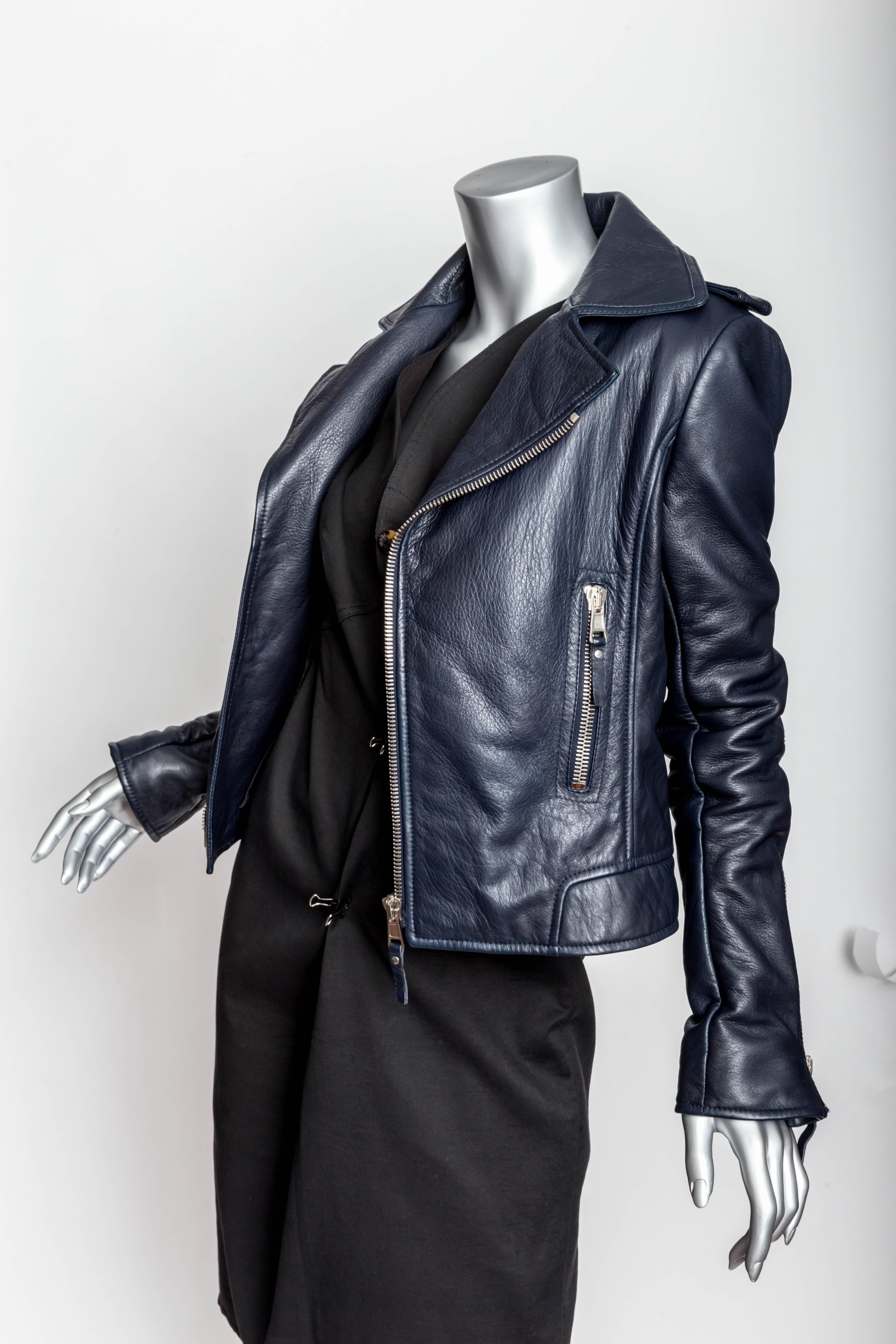 Amazing Balenciaga motorcycle jacket in navy.
Perfect condition.
Wonderful detail.
Size 42.
