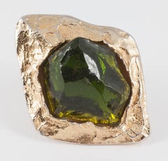Very large olive green Lucite and gilt ear clips , Yves Saint Laurent, 1980s.