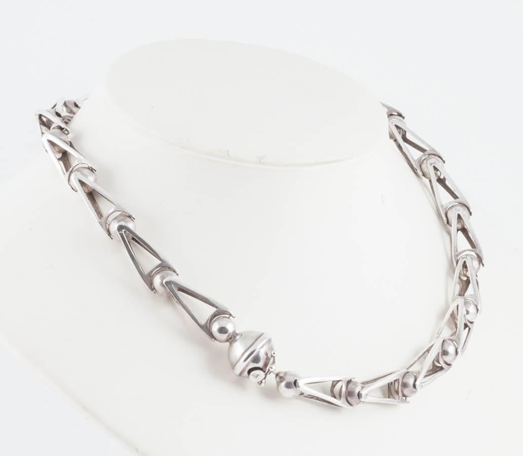 Women's or Men's Hand made dynamic articulated ball and triangle sterling silver necklace 