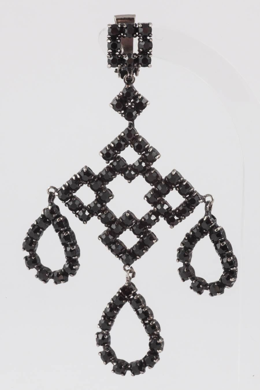 Beautiful all black chandelier earrings, in a , geometric squared pattern with three articulated loops, all set in a gunmetal setting,  light to wear, easy to wear and very eye catching.