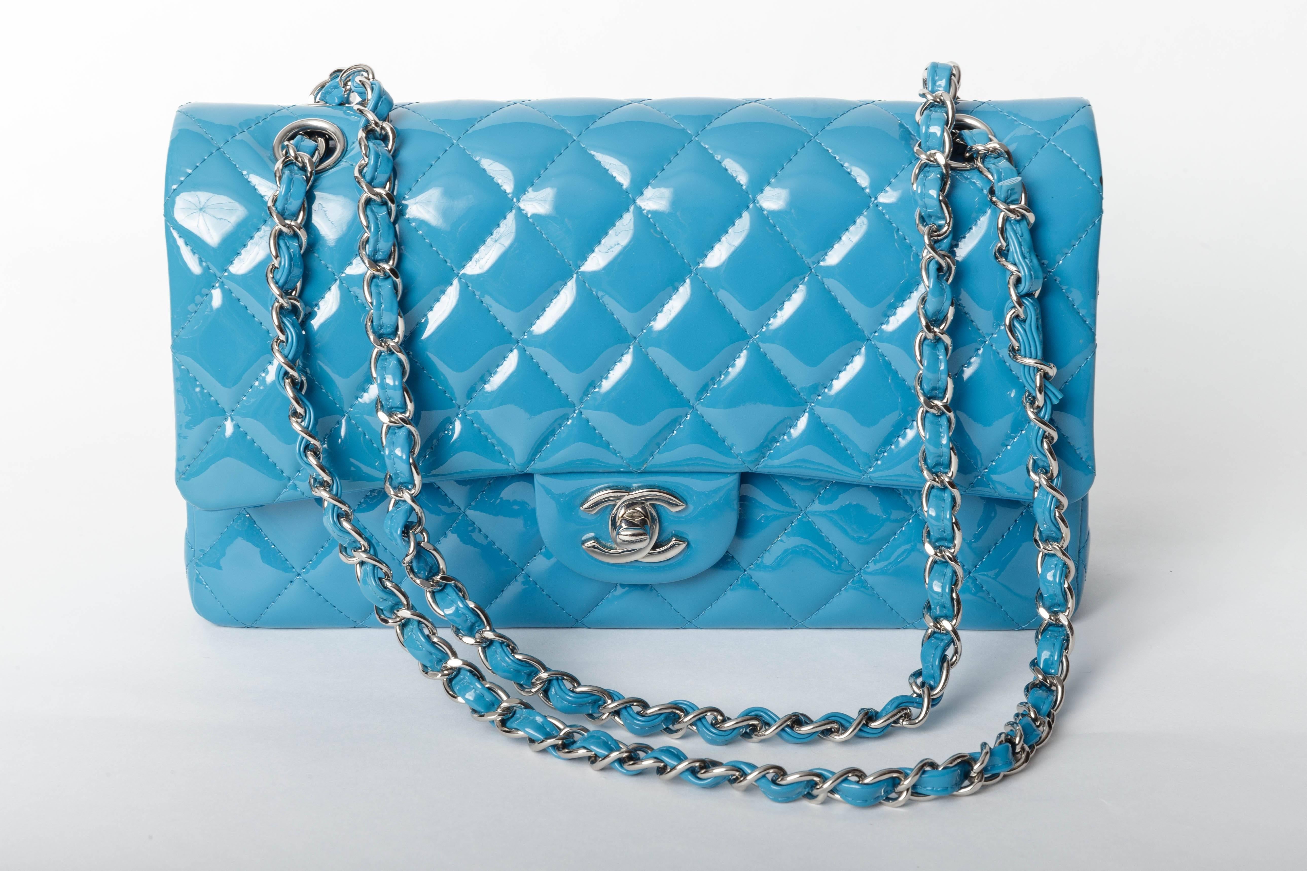 Stunning Chanel Double Flap Classic in Teal Patent with Silver Hardware
10 Inches in Excellent Condition
Dustbag is Included
Authenticity Card No 19485857 denotes the year 2014