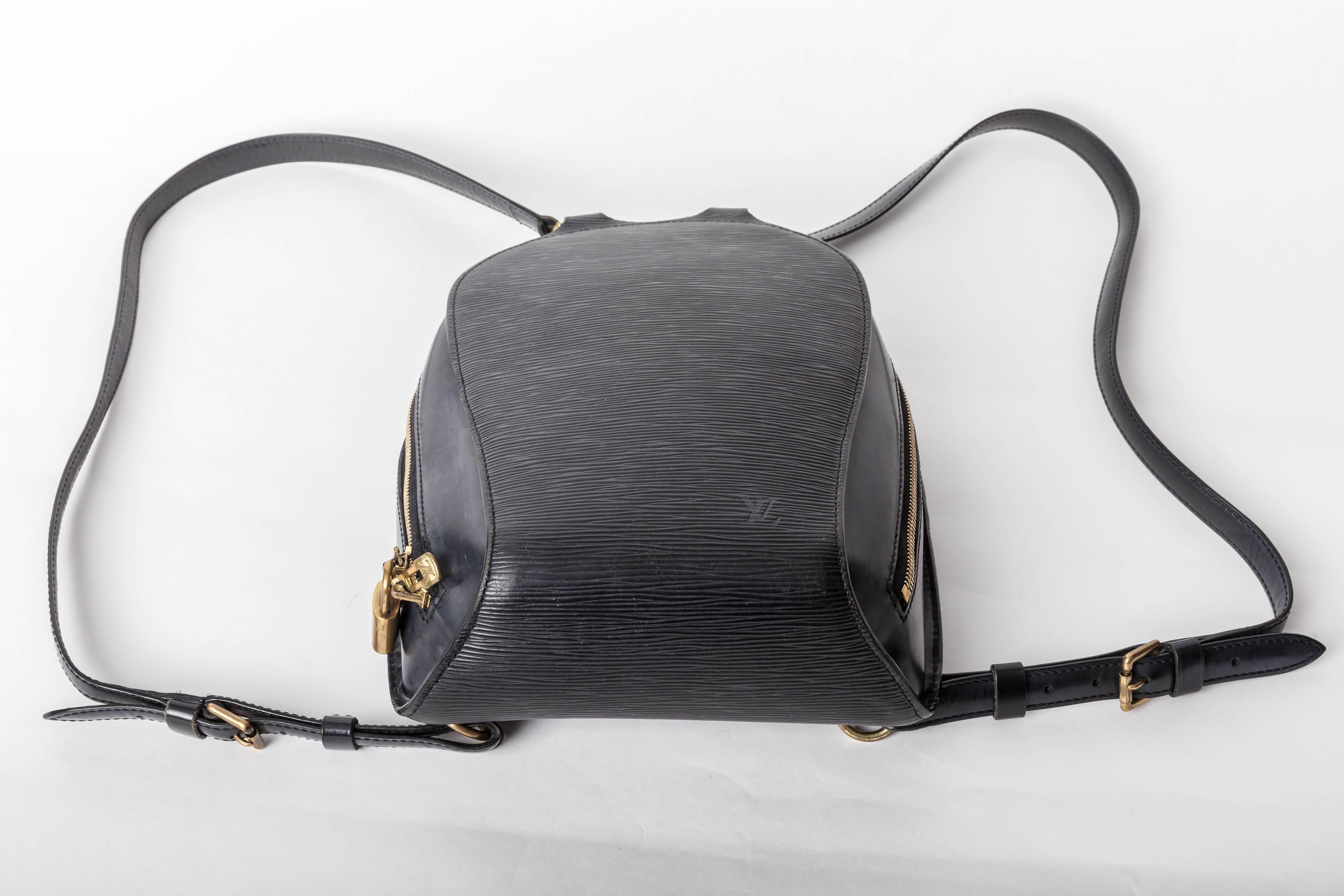 Fantastic Louis Vuitton Backpack in Black  Epi Leather
Front Zip Pocket
Adjustable  Straps
Lock is Present However the Key is Missing

