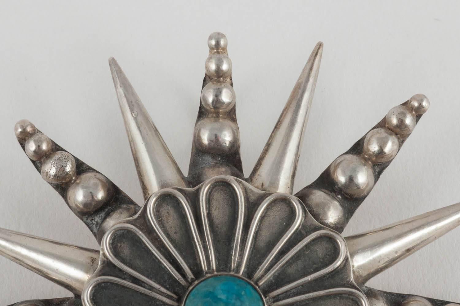  Mexican Sterling silver and turquoise 'star' pendant or brooch, 1950s In Excellent Condition In Greyabbey, County Down