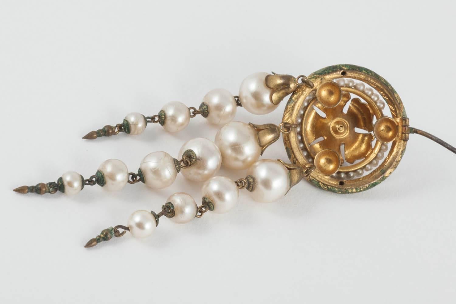 Women's A pair of handblown glass pearl and enamelled gilt hat pins, 19th Century