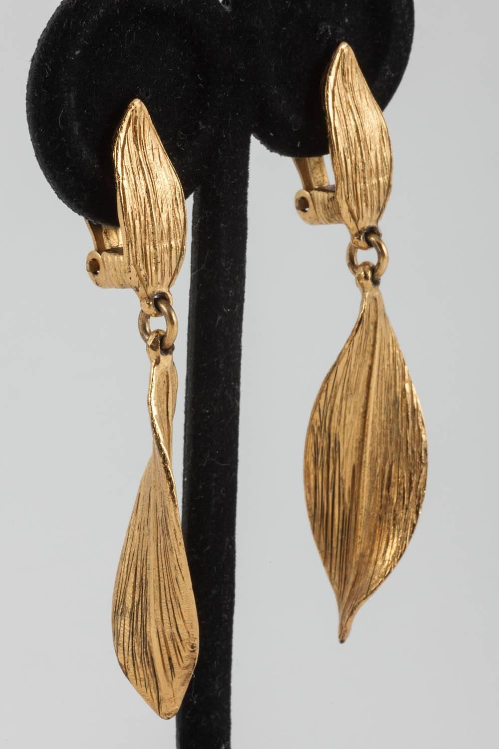 Elegant twisted leaf earrings of lovely quality gilt metal by Christian Dior Boutique.  These clip on earrings are comfortable to wear and move gently when worn. 
Christian Dior was born into a wealthy family in 1905, being raised in the Normandy