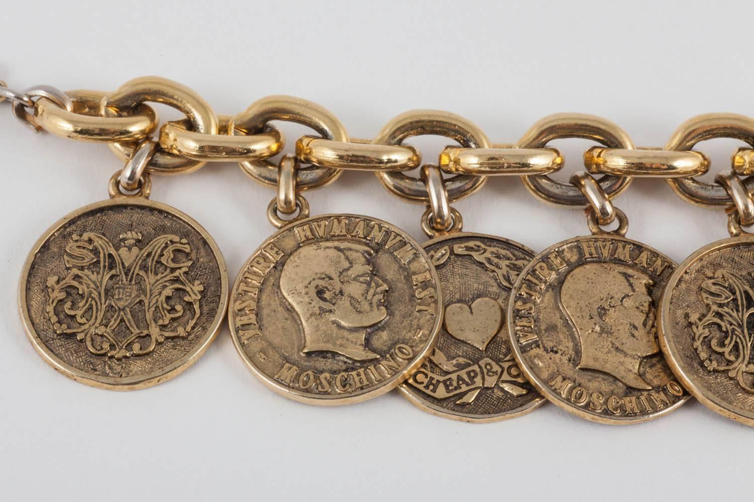  Early 'Cheap and Chic' antiqued gilt coins charm bracelet, Moschino, 1990s  In Good Condition In Greyabbey, County Down