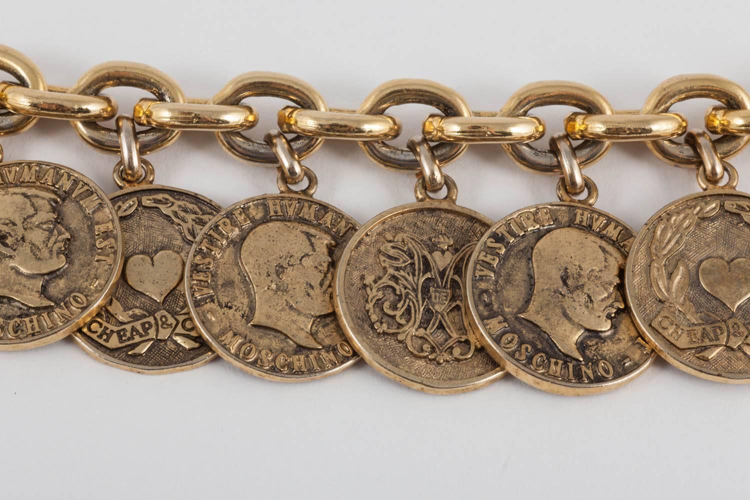 Women's or Men's  Early 'Cheap and Chic' antiqued gilt coins charm bracelet, Moschino, 1990s 