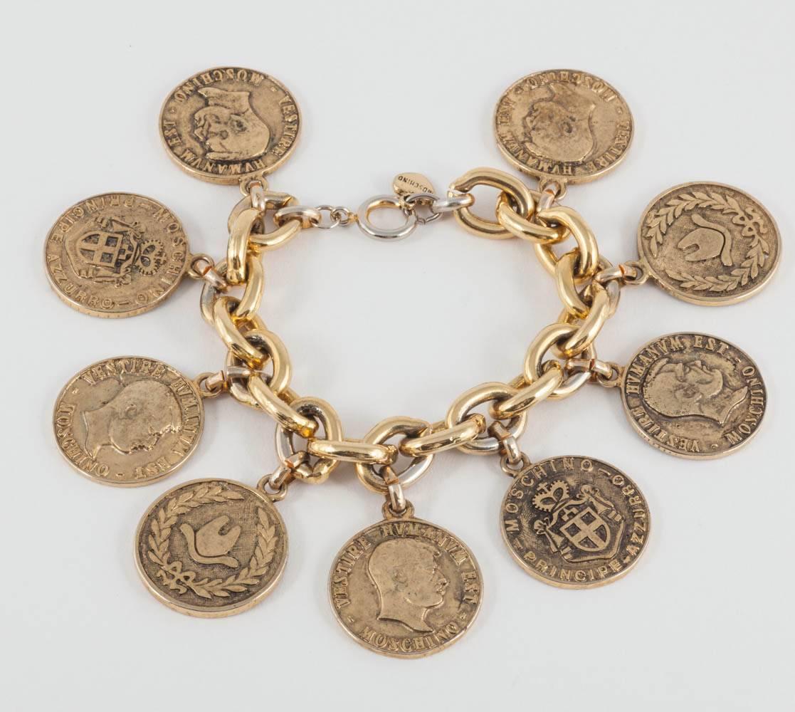  Early 'Cheap and Chic' antiqued gilt coins charm bracelet, Moschino, 1990s  3