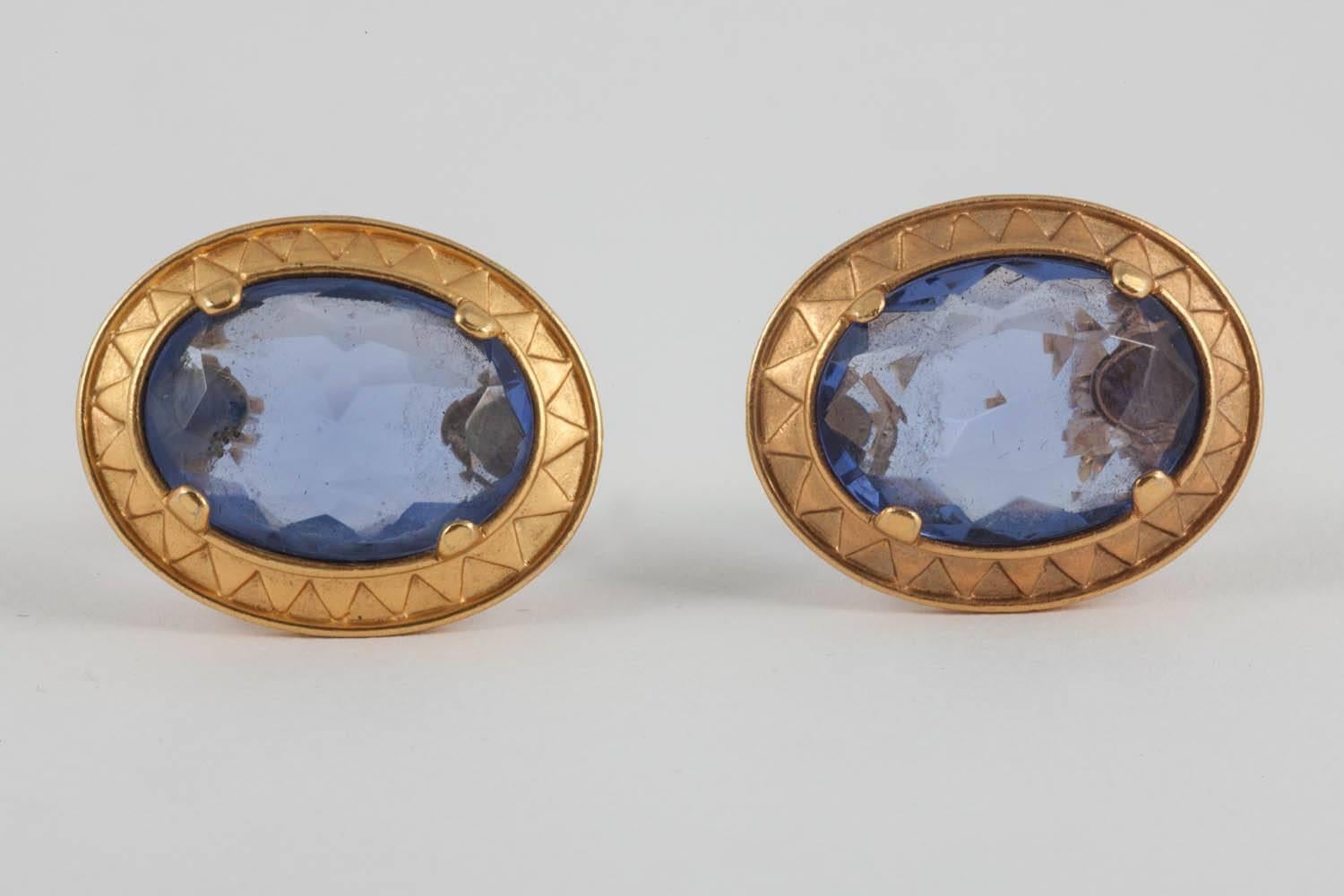 In a warm soft high karat colour gilding, these lovely Yves Saint Laurent earrings will work for day and night. 
The big clear blue central 'stone' is faceted for maximum sparkle.
Yves Saint Laurent was born in 1936, and became one of the 20th