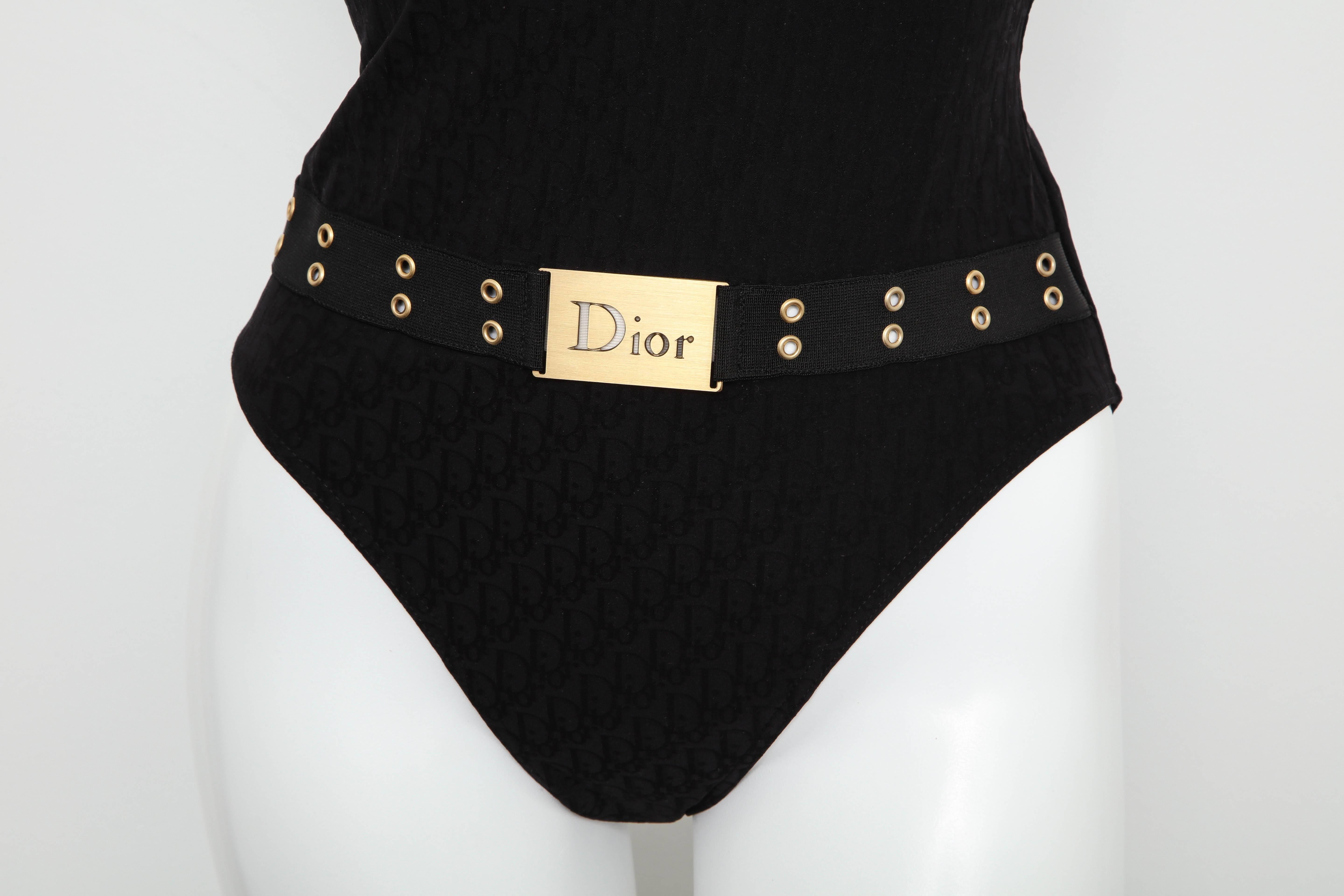 Extremely rare Christian Dior swimsuit in black with iconic logos and belt. From John Galliano era. 
Size FR 38. 