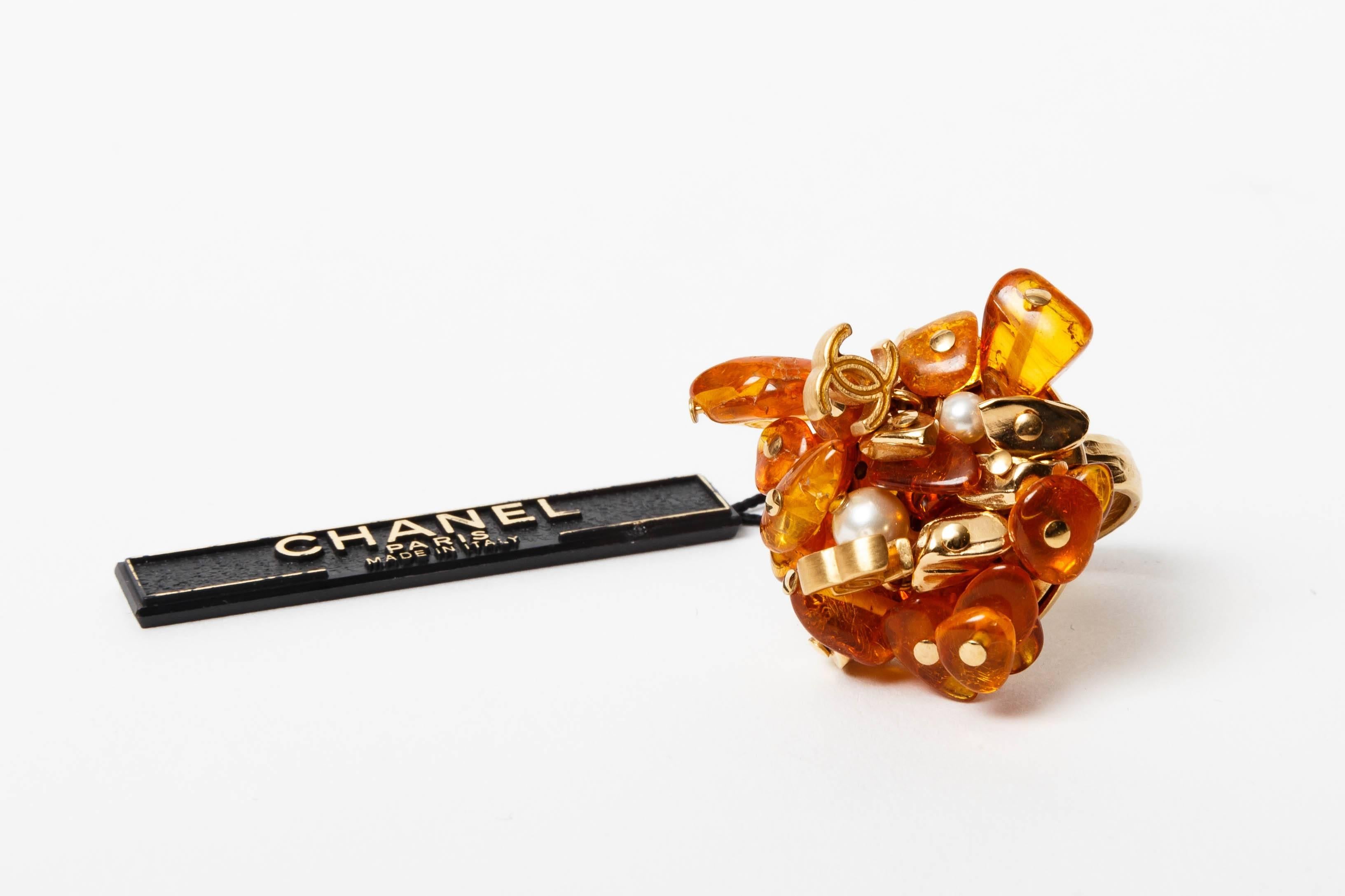 Women's Chanel Gold Metal Adjustable Logo Ring with Amber Resin   For Sale