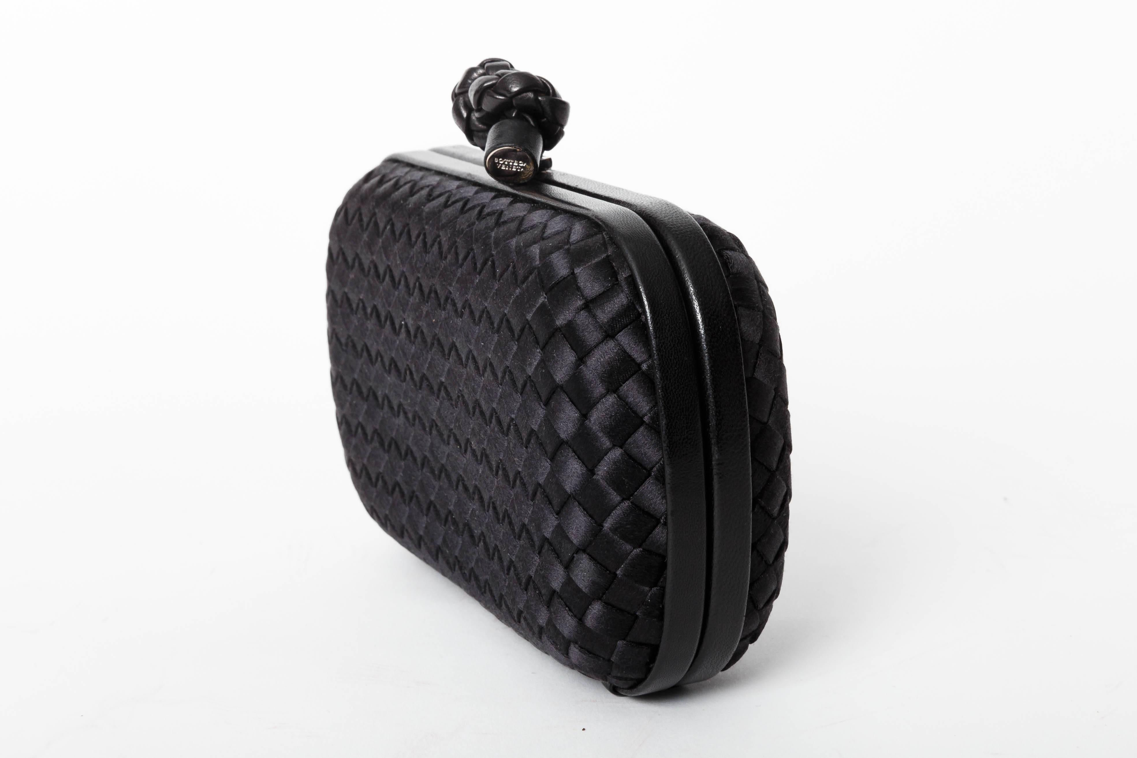 Stunning Bottega Veneta Knot Clutch in Black Silk with Leather Accents
Dustbag is included.
