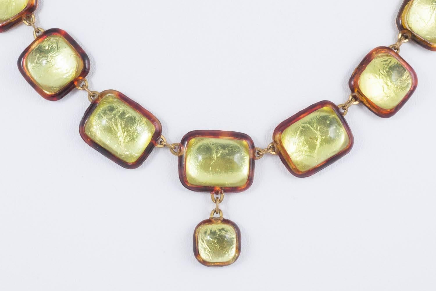 A bright and luminous necklace/sautoir made of resin and foil, in a beautiful tone of citrine/chartreuse. Attributed to Edith Barbier, it is very much in the style of work by Line Vautrin in the 1960s. Foil is place on the resin and then further