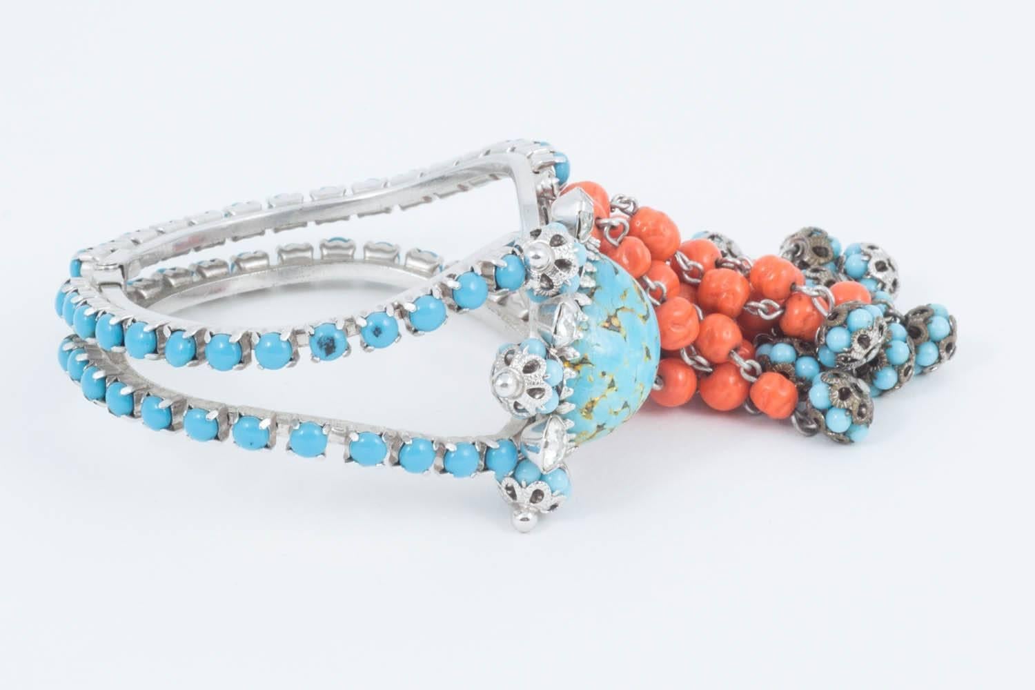Women's  Prong set silvertone, turquoise and coral glass clamper 'cha cha' bracelet 1950s