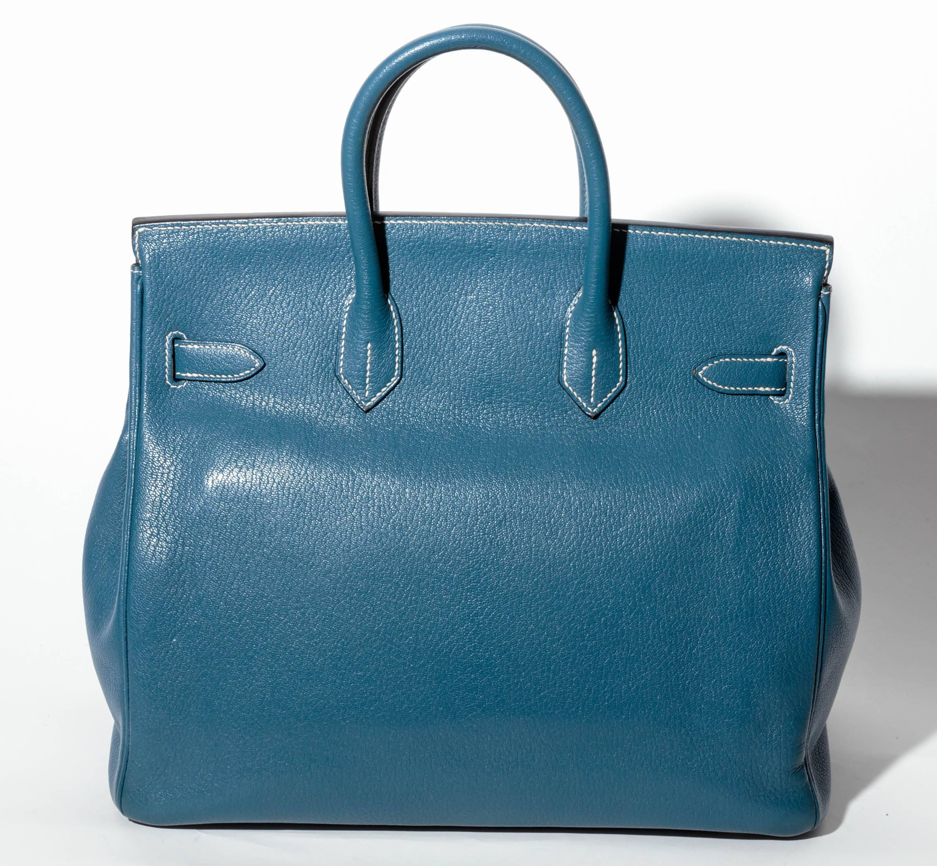 Very Rare Hermes Horseshoe Birkin in Thalassa Bleu with White Stitching and Gold Hardware.
This Birkin was custom made for our client and measures 32 cm in width.  
Condition is excellent.
Raincoat is included.
The Haut a Courroies (HAC) Birkin is