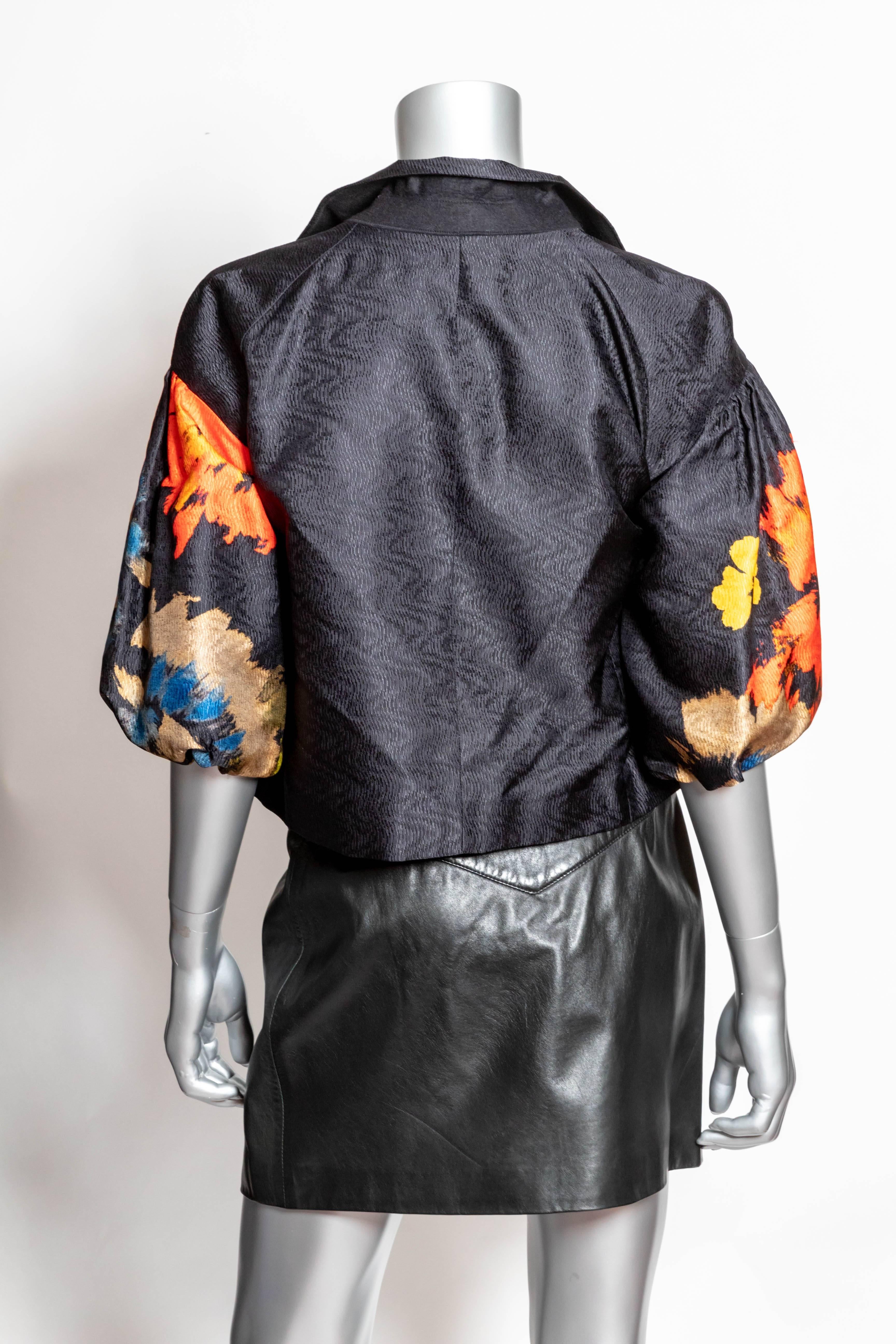 Stunning Dries Van Noten Black Silk Jacket with Drop Shoulder Elbow Length Balloon Style Sleeves 
This vintage jacket is in excellent condition.
Sleeve length from top of shoulder is 14 inches.
