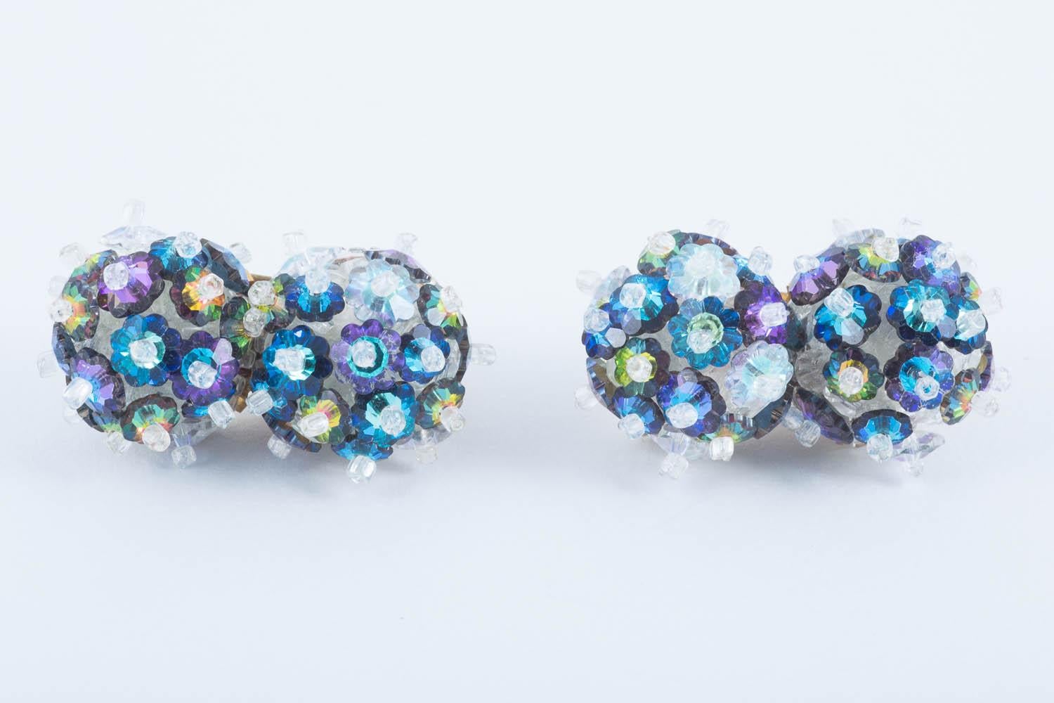 These earrings are everything we love about Lydia Coppola's work! Made from Swarovski 'Margarita' crystals mounted onto a weft of beads - incredible colour combinations, really interesting design and structure, light enough to be comfortable and in