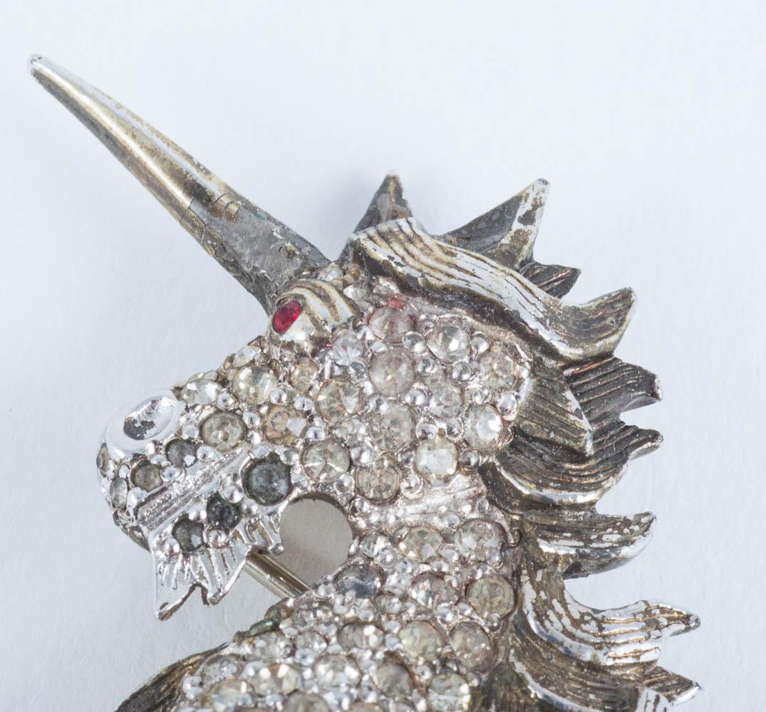 Women's or Men's A pair of paste and gilt metal 'unicorn' brooches, Christian Dior, c1954.