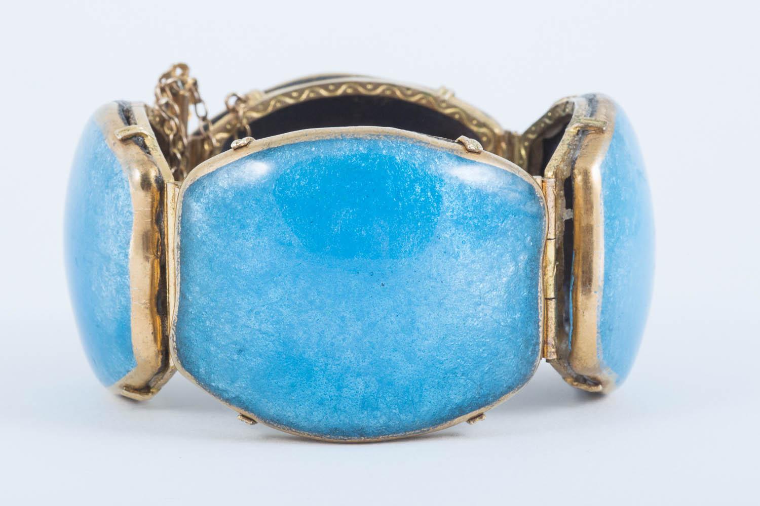 This incredible turquoise enamel cuff is signed Castel who designed decorative items and jewellery for Limoges in the 1940s. What makes this bracelet so special is the very large full panels of deep azure blue enamel, well mounted on slightly