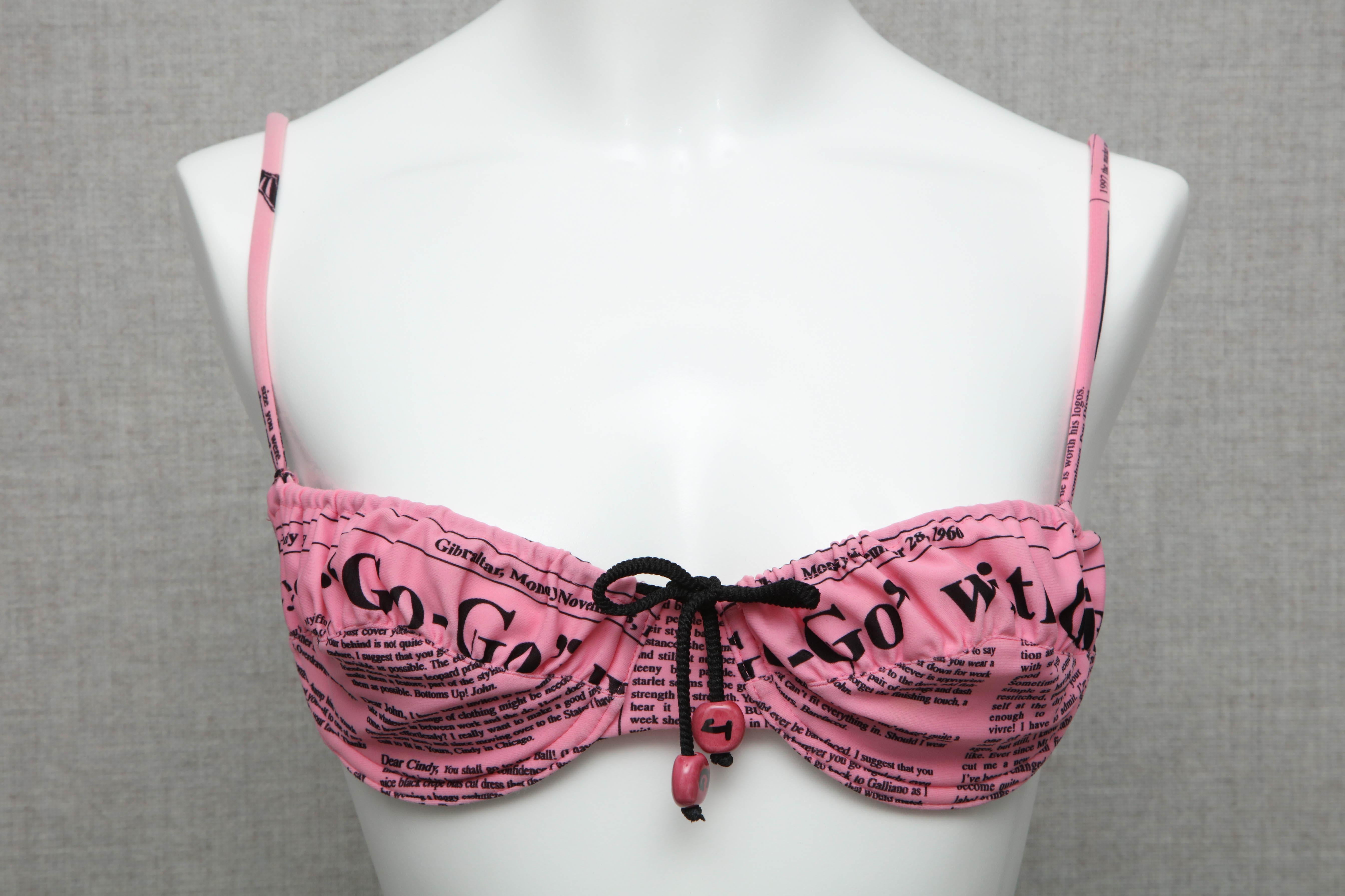 Extremely rare John Galliano iconic pink newspaper print bikini.

