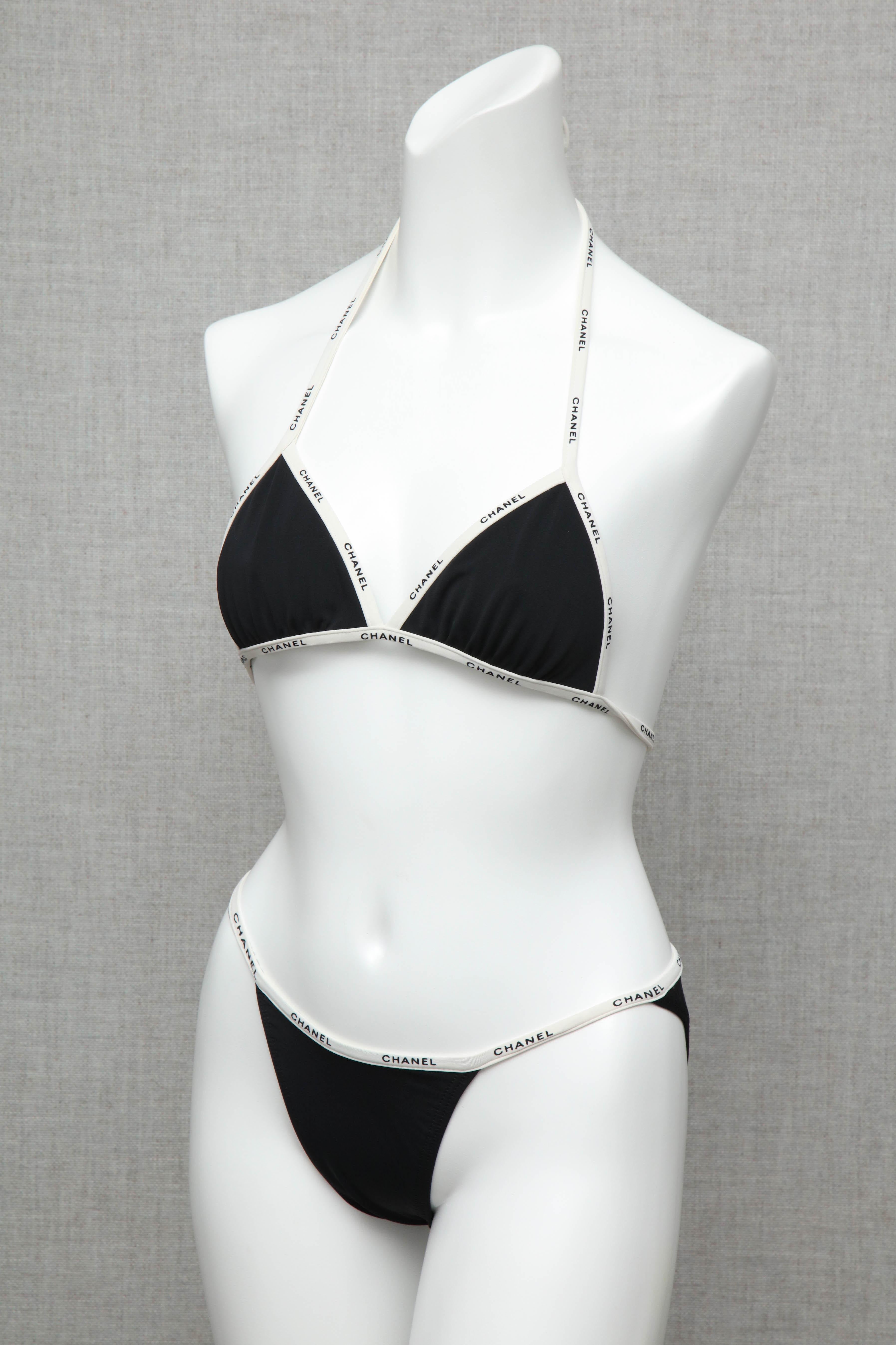 Extremely rare vintage Chanel black and white bikini with iconic Chanel logos.

Size: 36