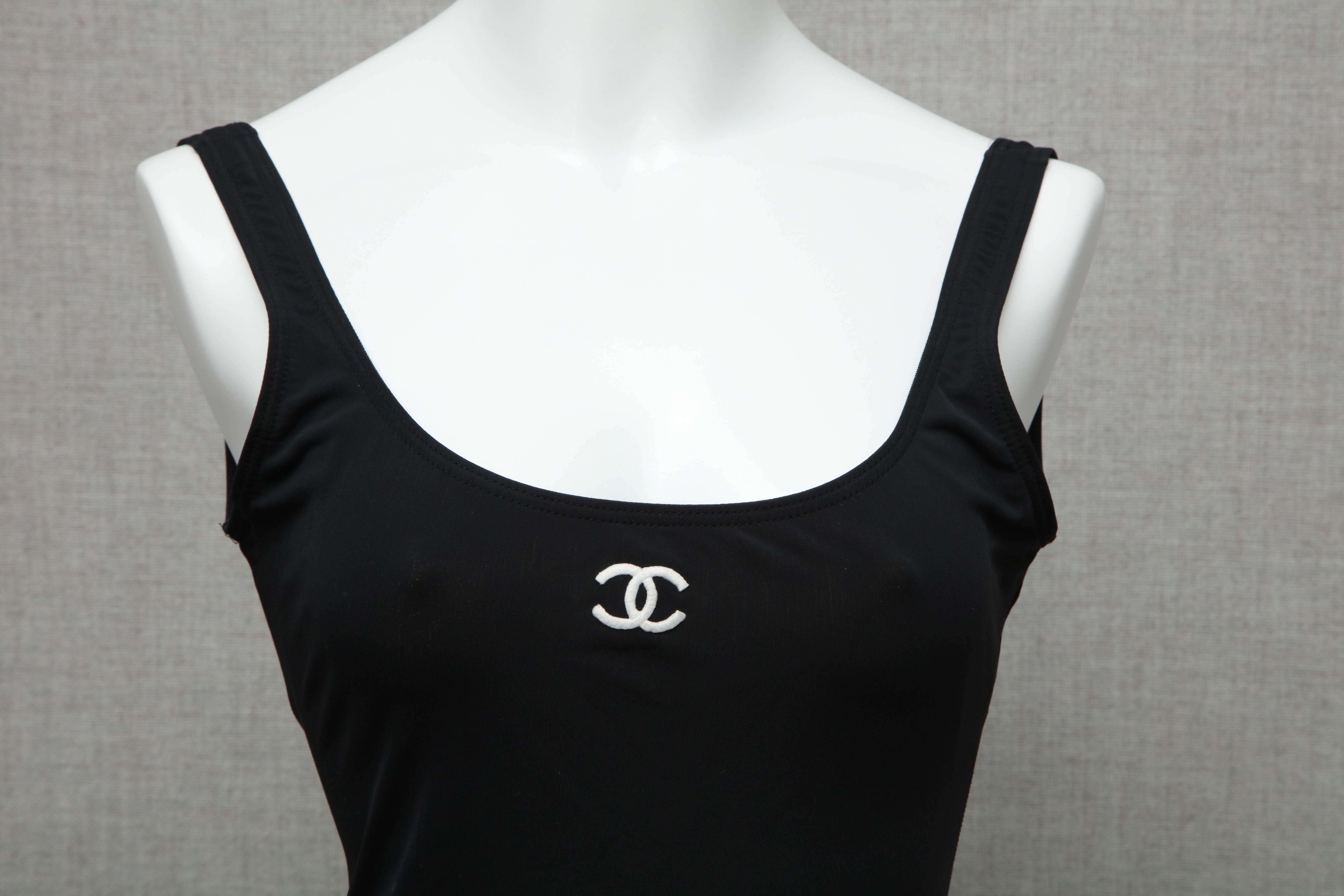 Chanel black and white swimsuit with iconic CC logos. 
FR 38