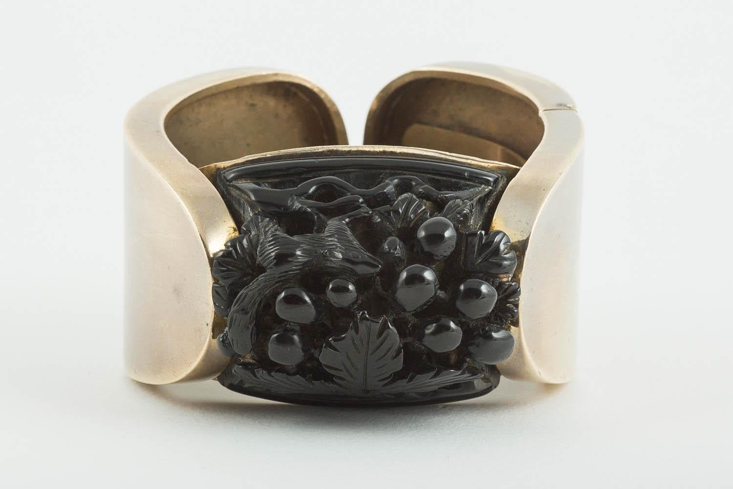 Women's Black carved galalith, gilded metal clamper bangle and belt, French, 1920s/30s. For Sale