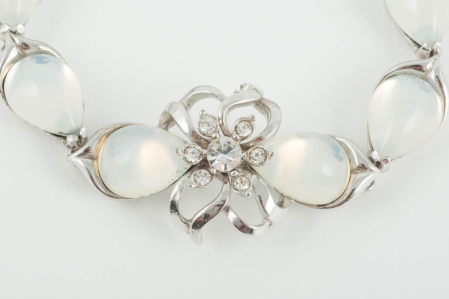 Women's Rhodium metal, glass moonstone and paste parure, Mitchel Maer, England, 1950s For Sale