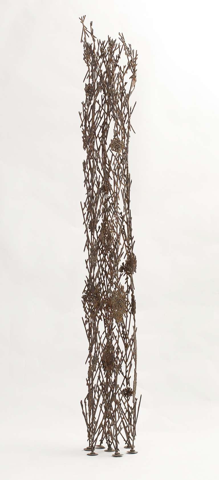 Cast and hand-collaged sculpture of phosphor bronze and silver by Richard Filipowski (1923-2008), executed, circa 1960-1965. Titled "Reed." Unsigned, with a certificate of authenticity from the Filipowski estate.