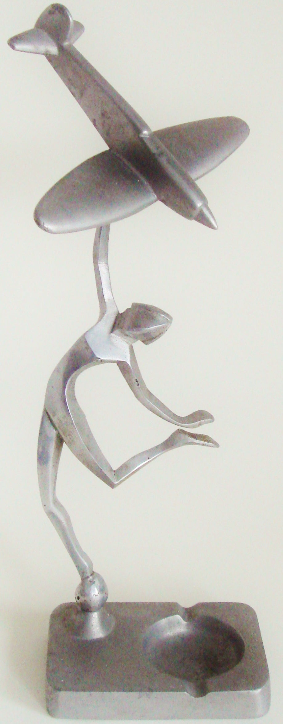 Italian Art Deco / Machine Age Figural Aluminium Nude and Airplane Ashtray