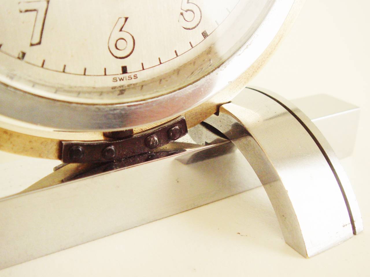Plated English Art Deco Asymmetrical Chrome and Brass, Mechanical Tilt Shelf Clock For Sale