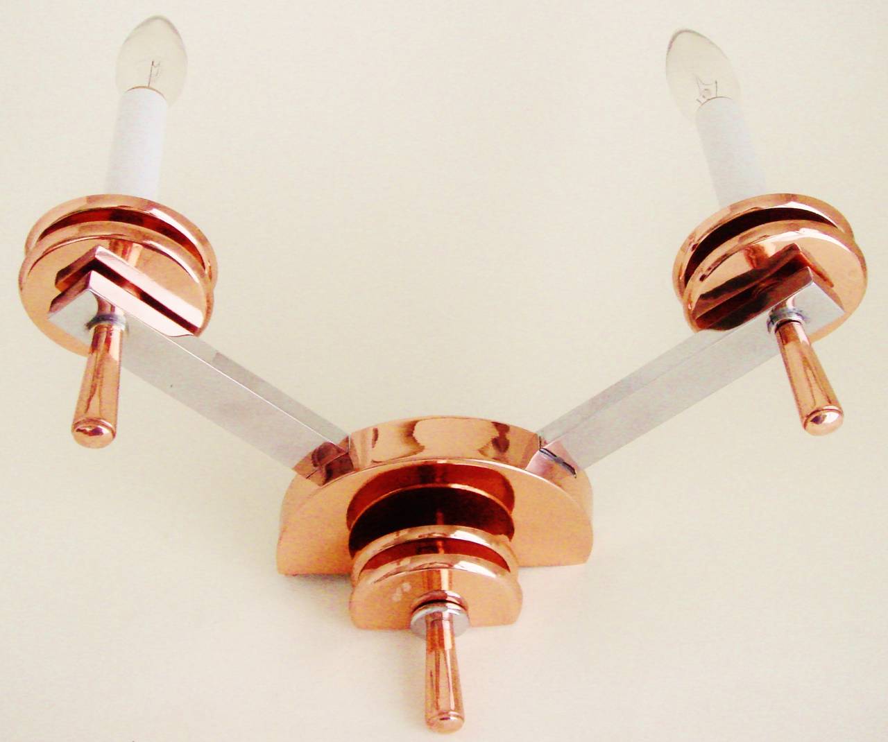 Mid-20th Century Pair of French Art Deco Chrome and Copper Twin Faux Candle Wall Sconces